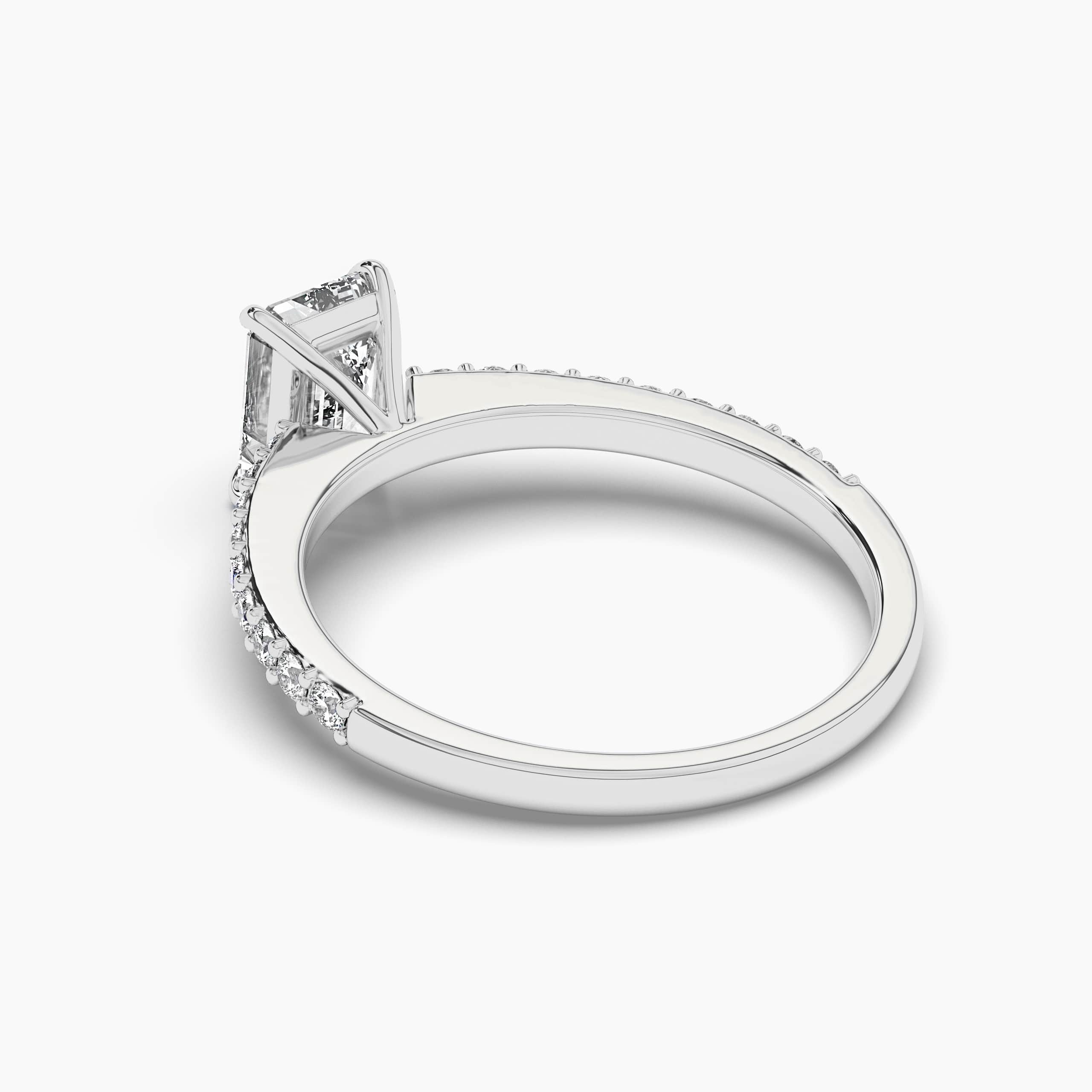 emerald cut diamond side stones ring with pave band 