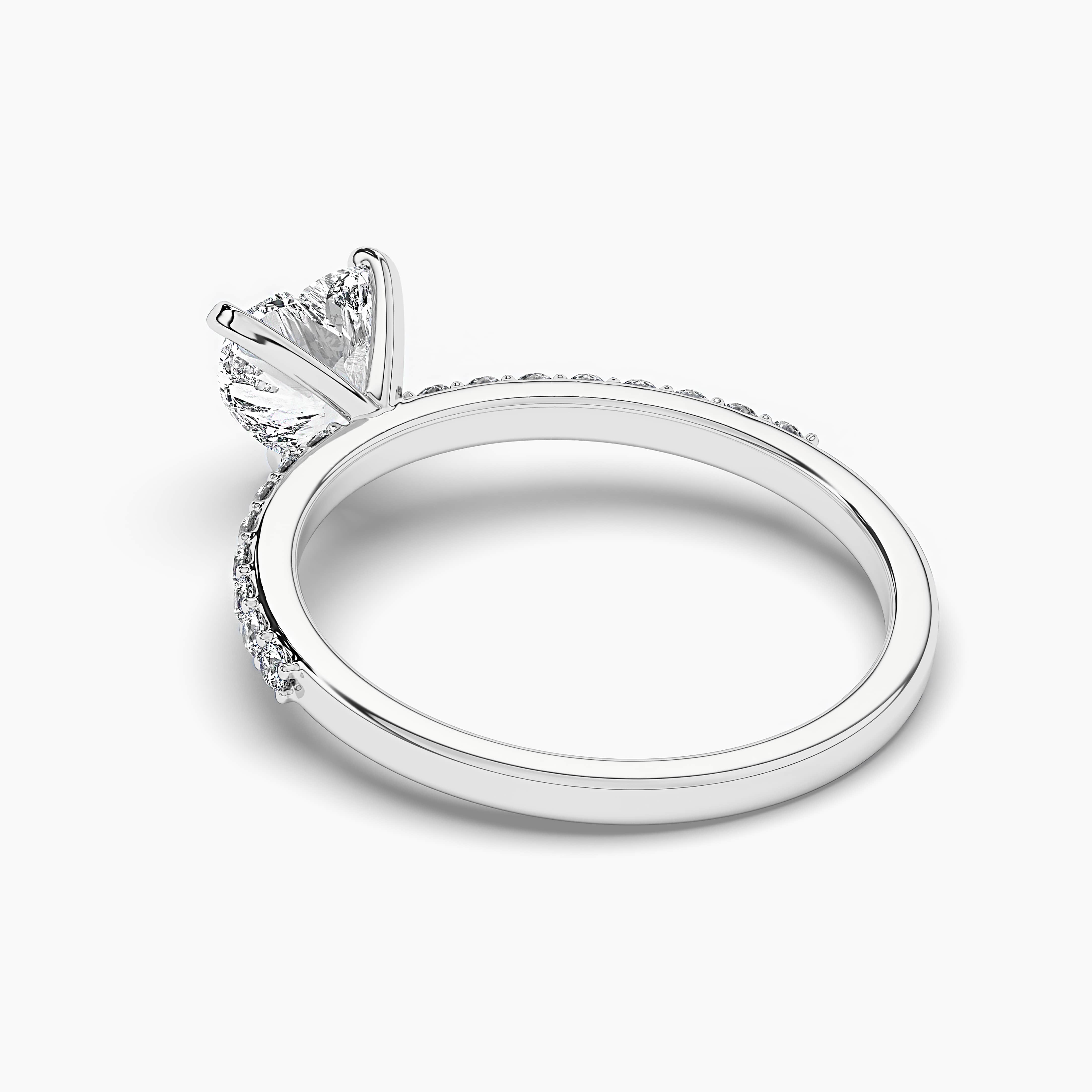 White gold engagement ring with heart-shaped diamond