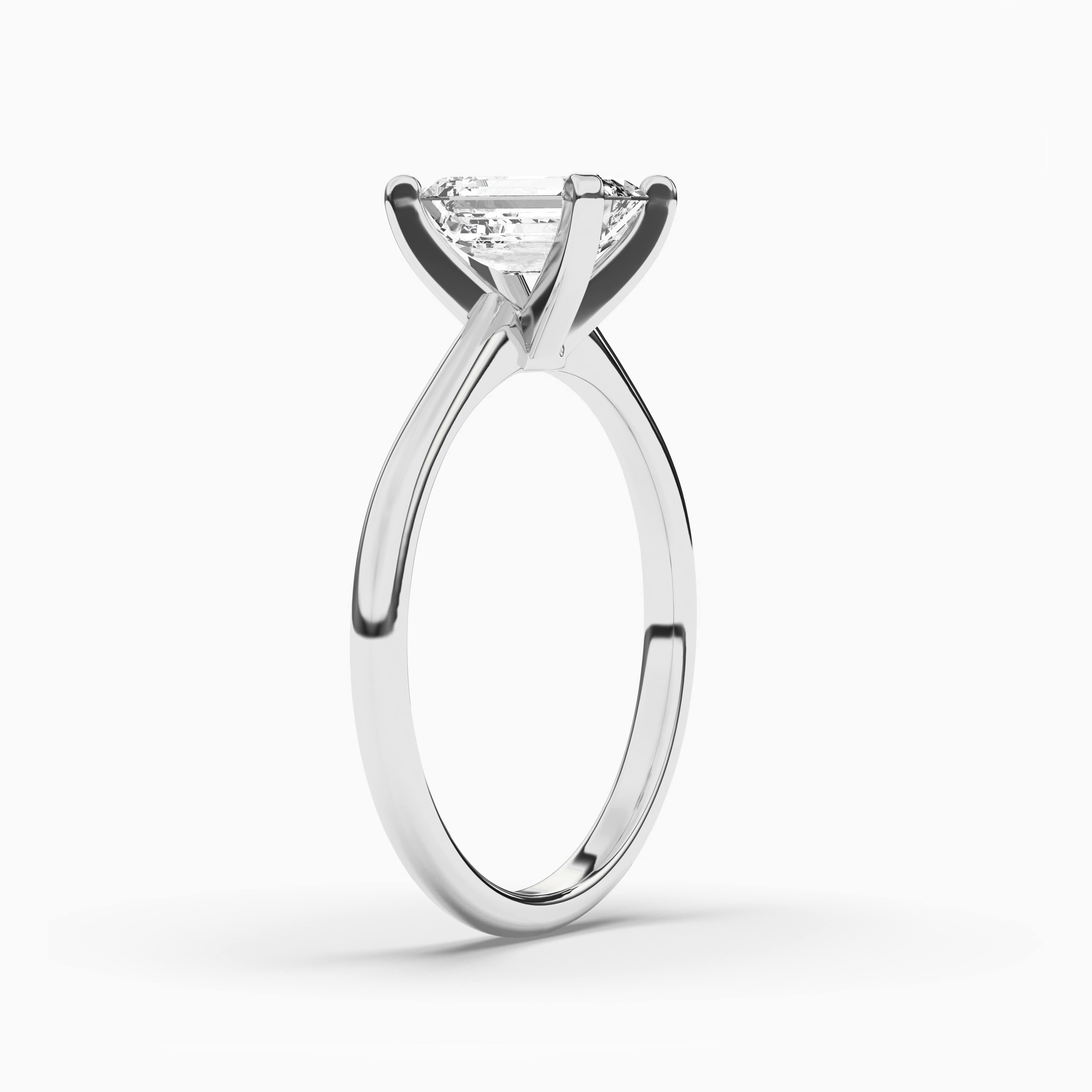 White Gold Emerald Cut Side Stone Diamond Engagement Ring