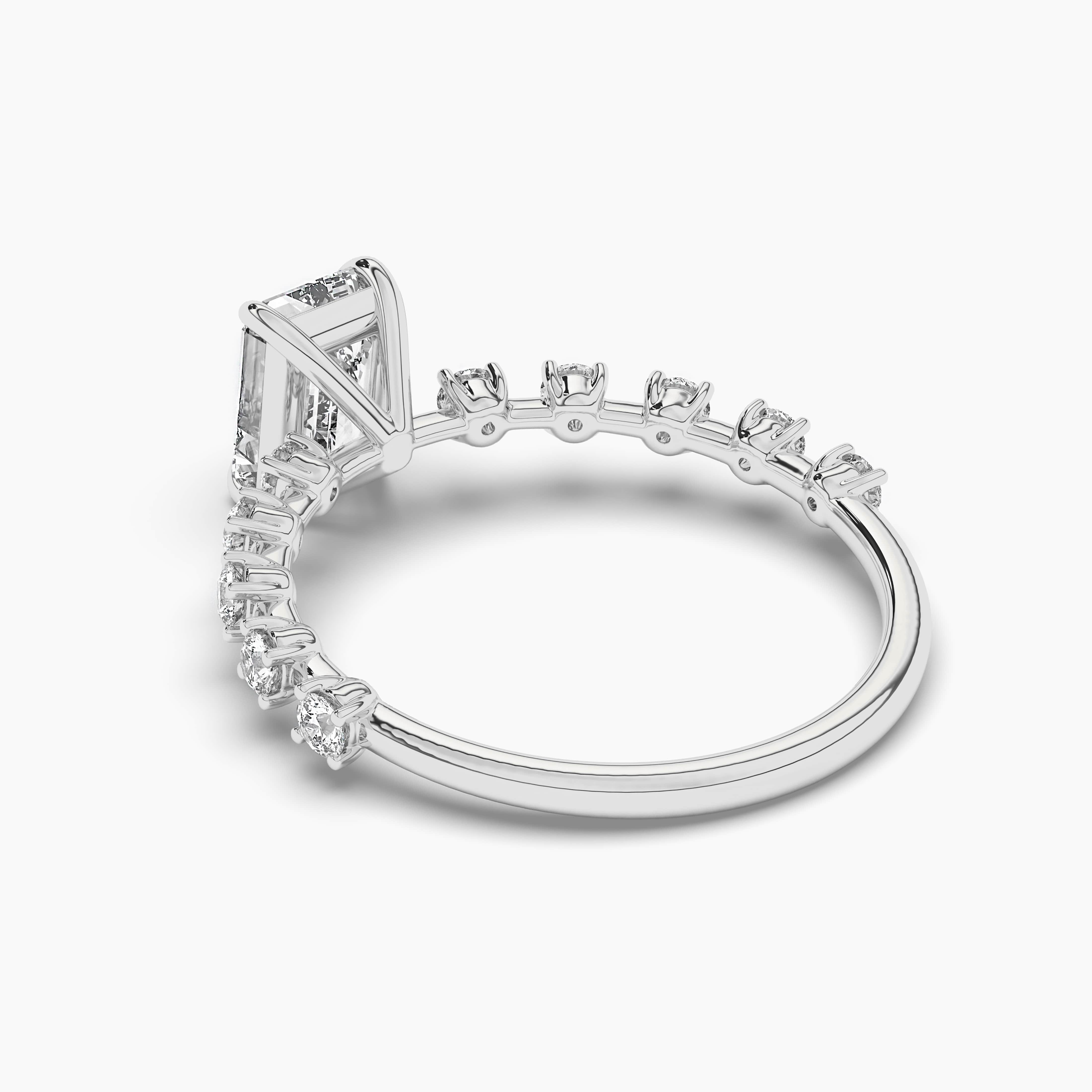 sideways emerald cut engagement rings