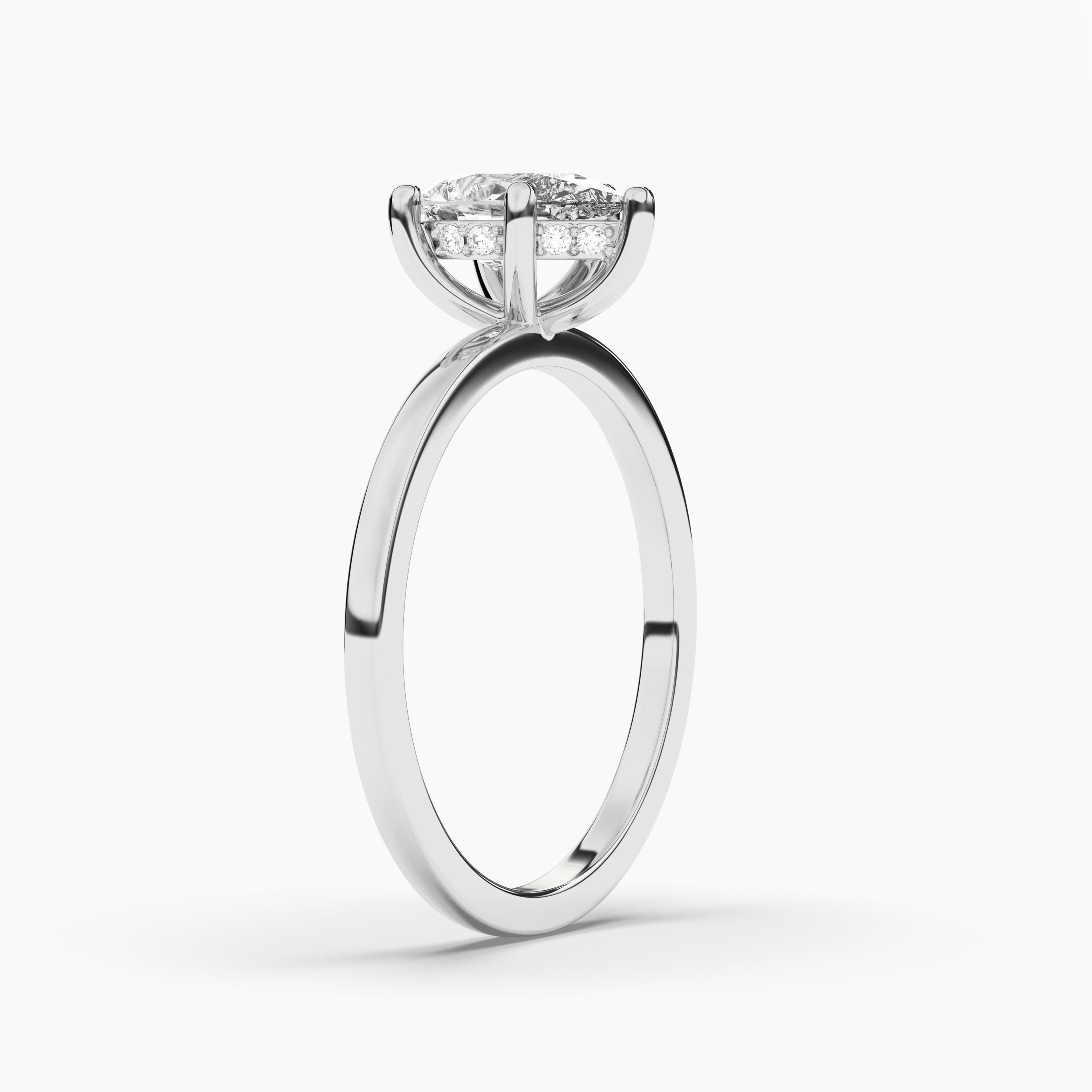 pear shaped hidden halo engagement ring