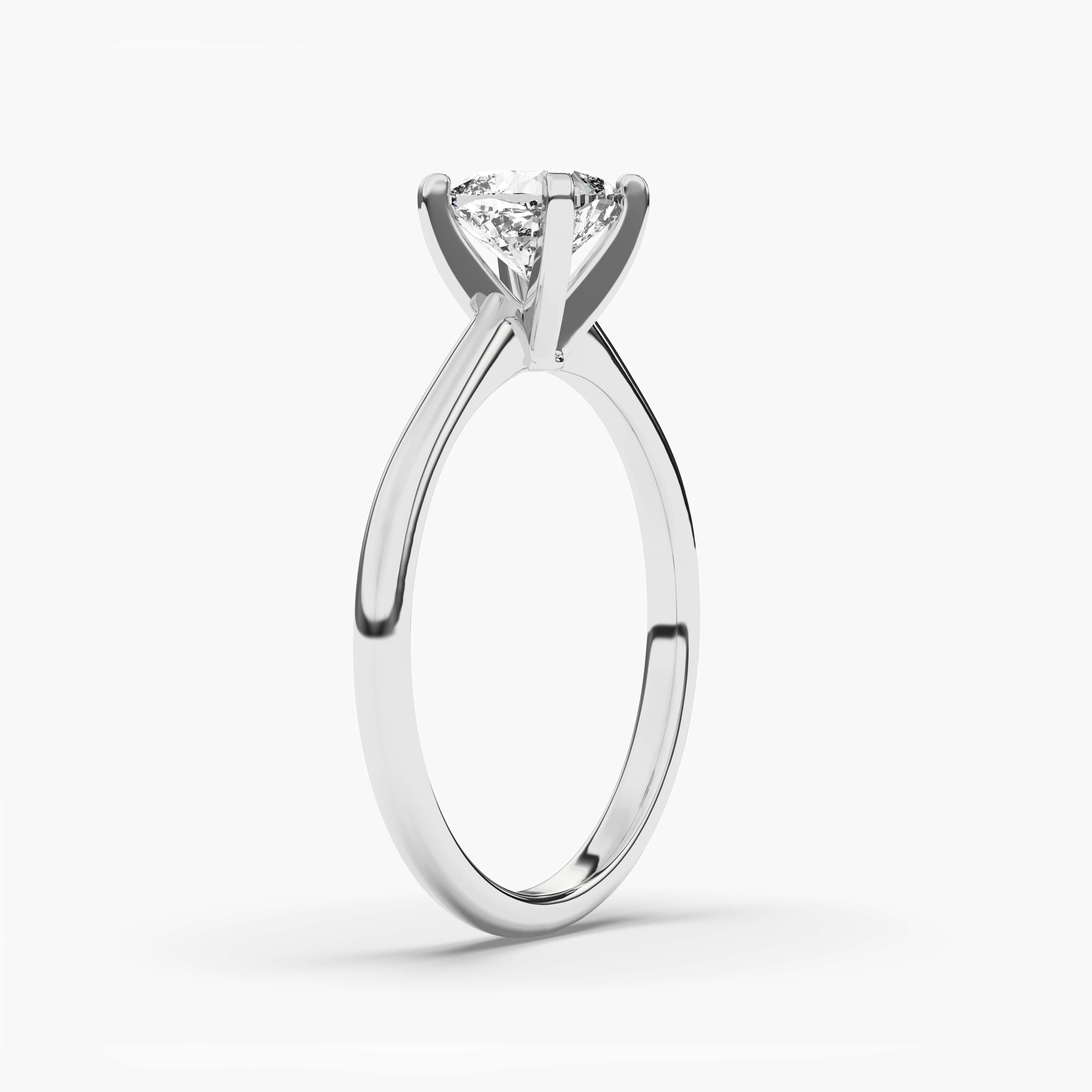 ELONGATED CUSHION CUT SOLITAIRE DIAMOND RING