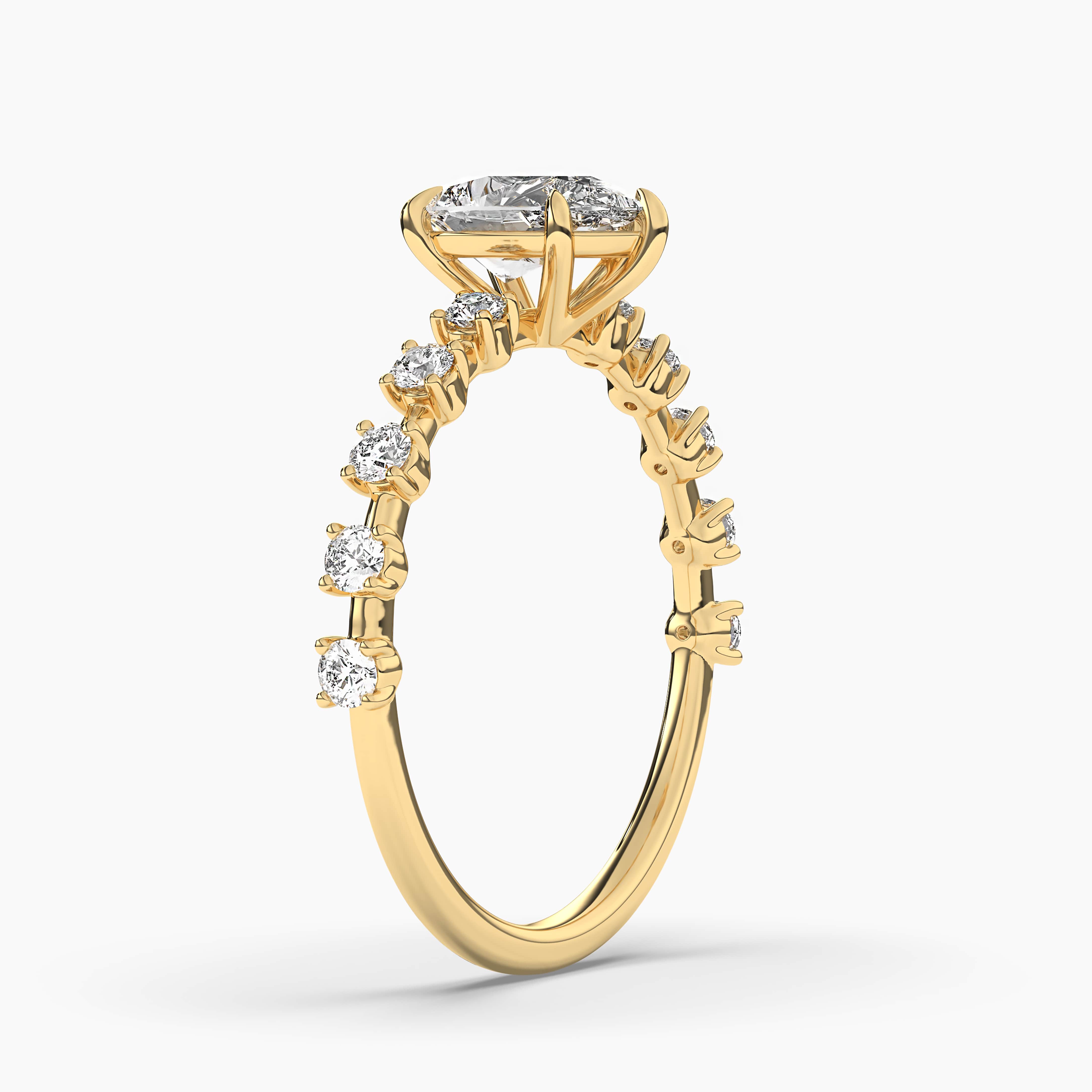 yellow gold pear cut side stones diamond ring