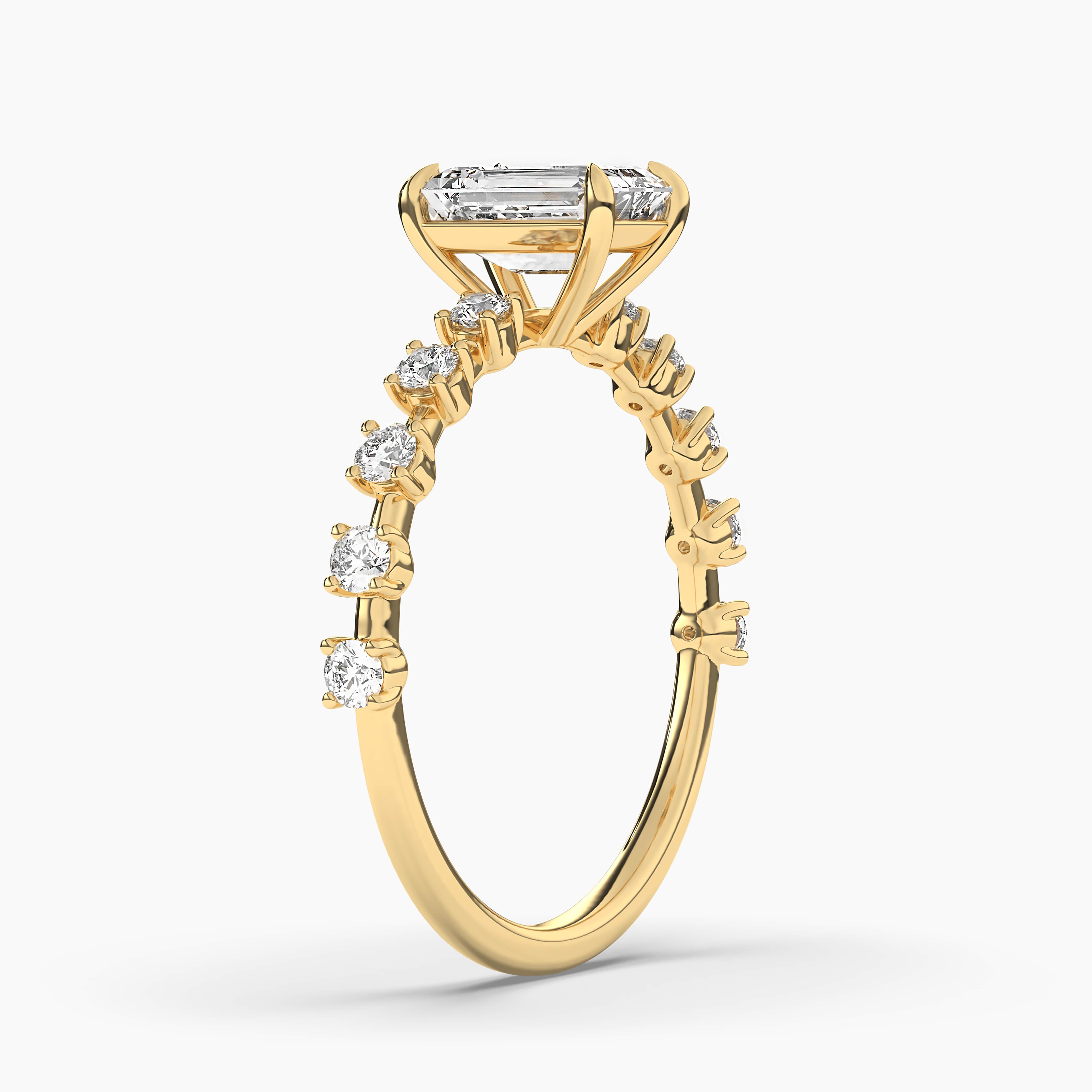 Emerald Cut Blue Sapphire and Round Diamond Ring in Yellow Gold