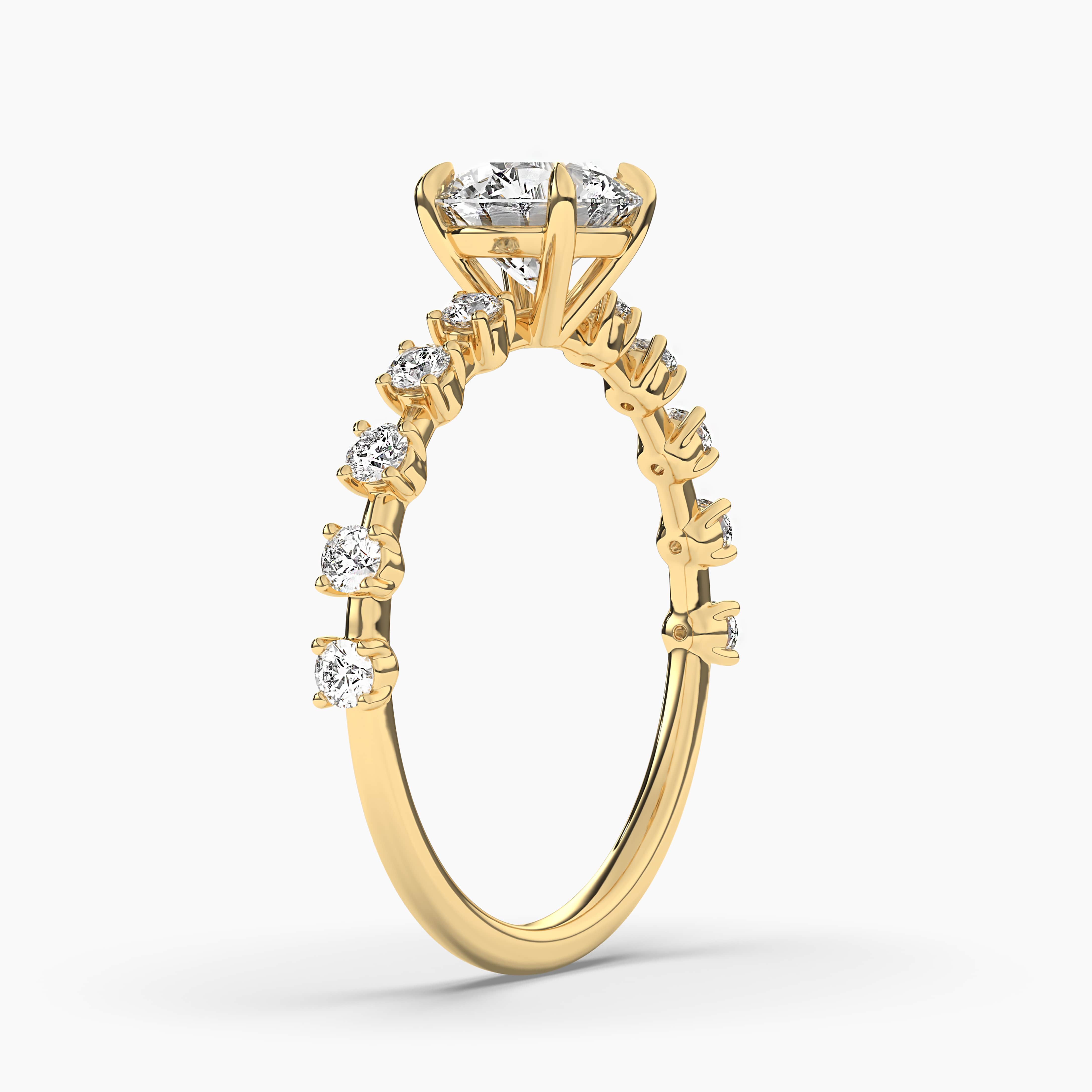 yellow gold round cut side stones diamond ring 