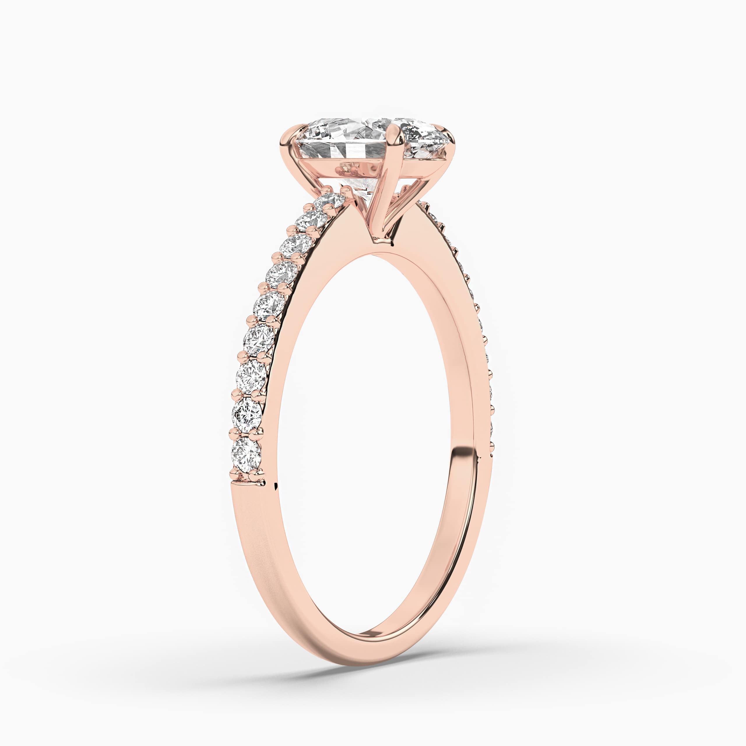 Oval Cut with Emerald Side Stones Diamond Engagement Ring in Rose Gold