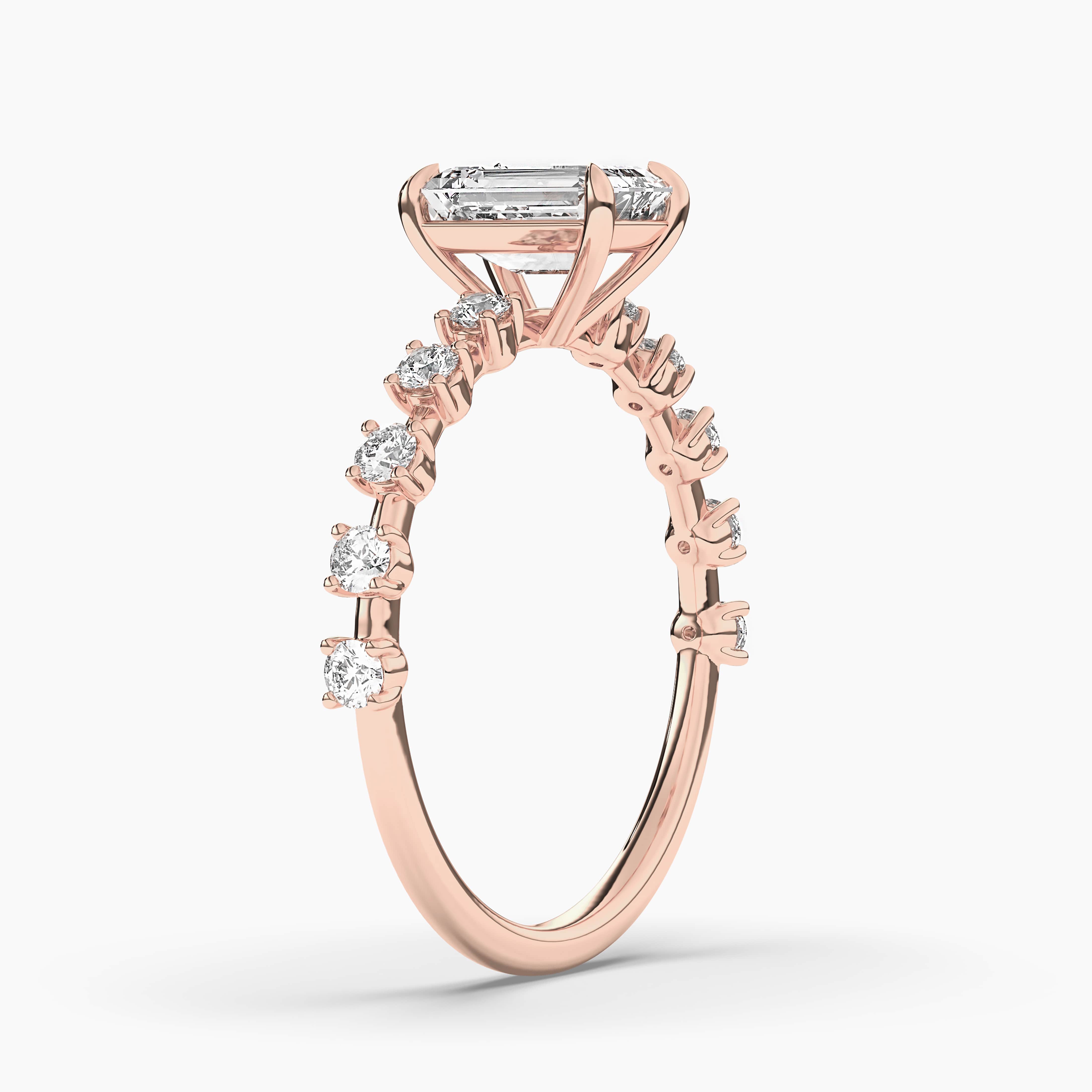 Rose Gold Emerald Cut Solitaire Engagement Ring with Pave Diamonds