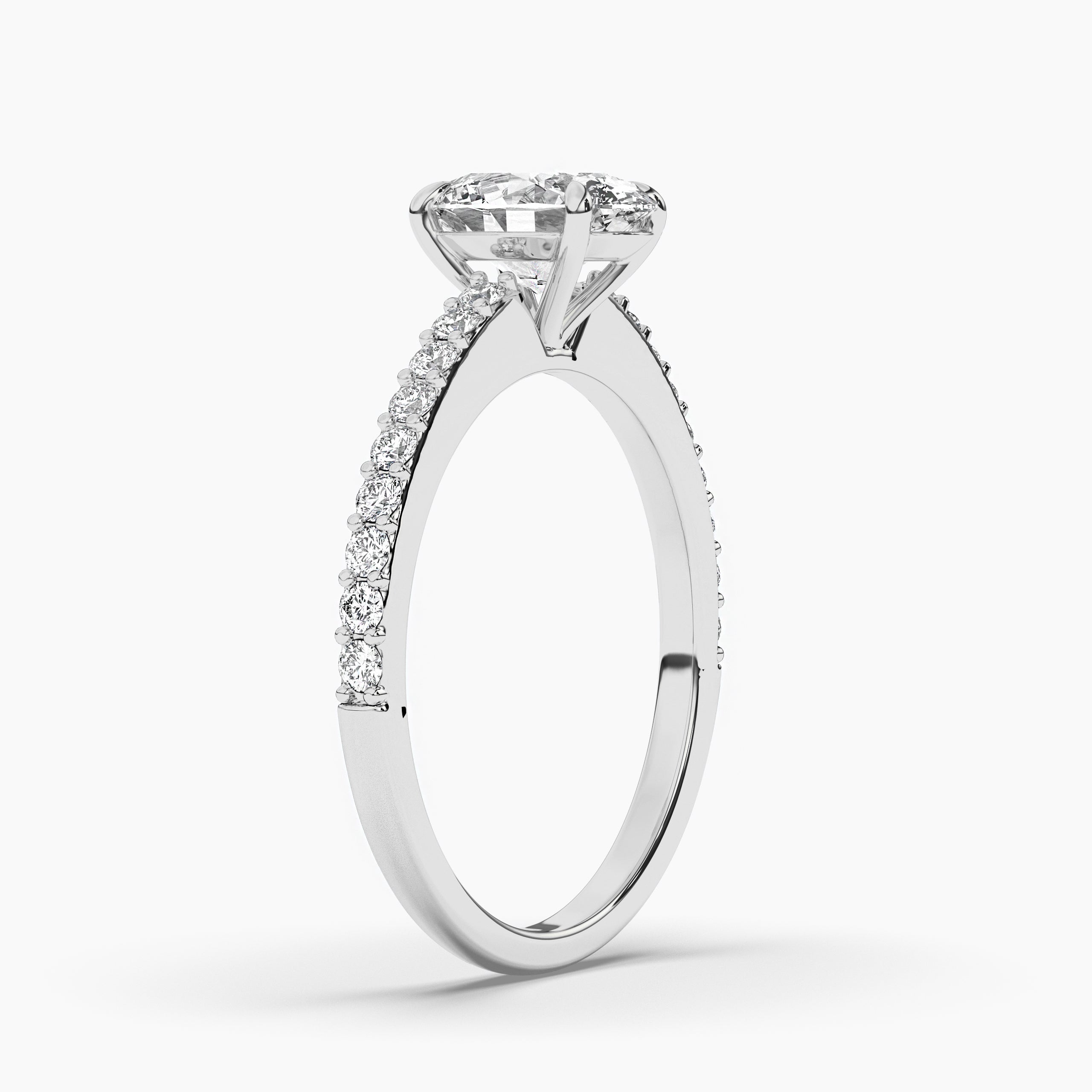 oval engagement ring with solitaire side stones