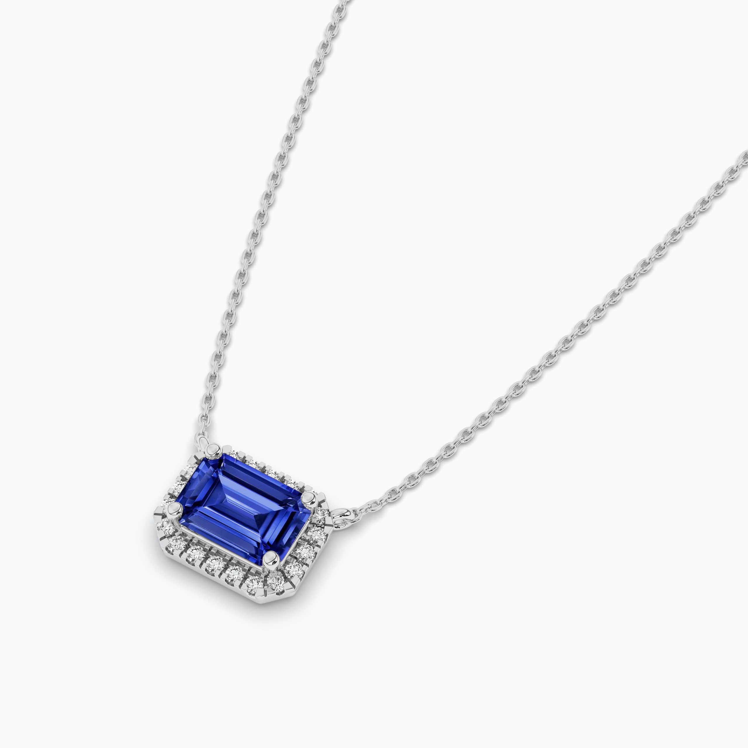 Emerald Cut Blue Sapphire Gemstone with Diamond Halo Pendant in White Gold