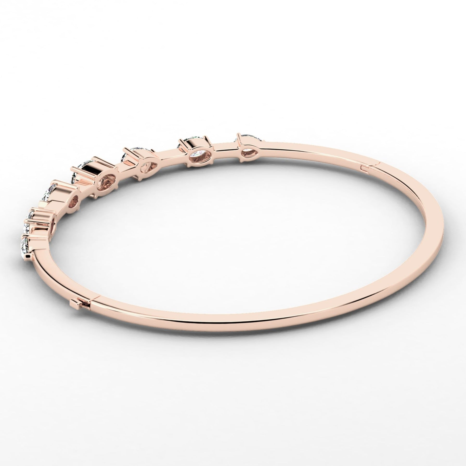 Rose gold pear and oval diamond bangle bracelet