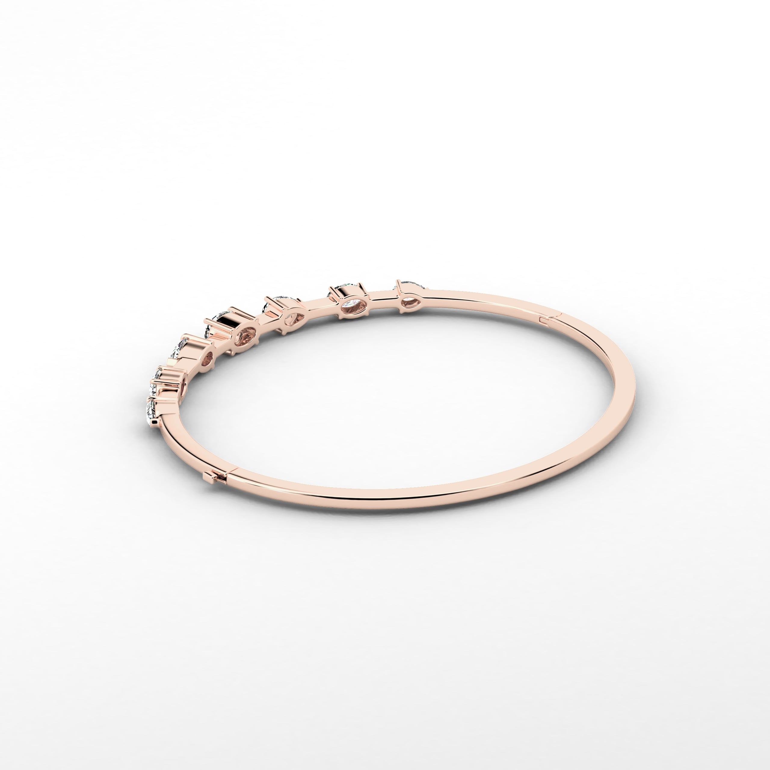 Rose gold pear and oval diamond bangle bracelet