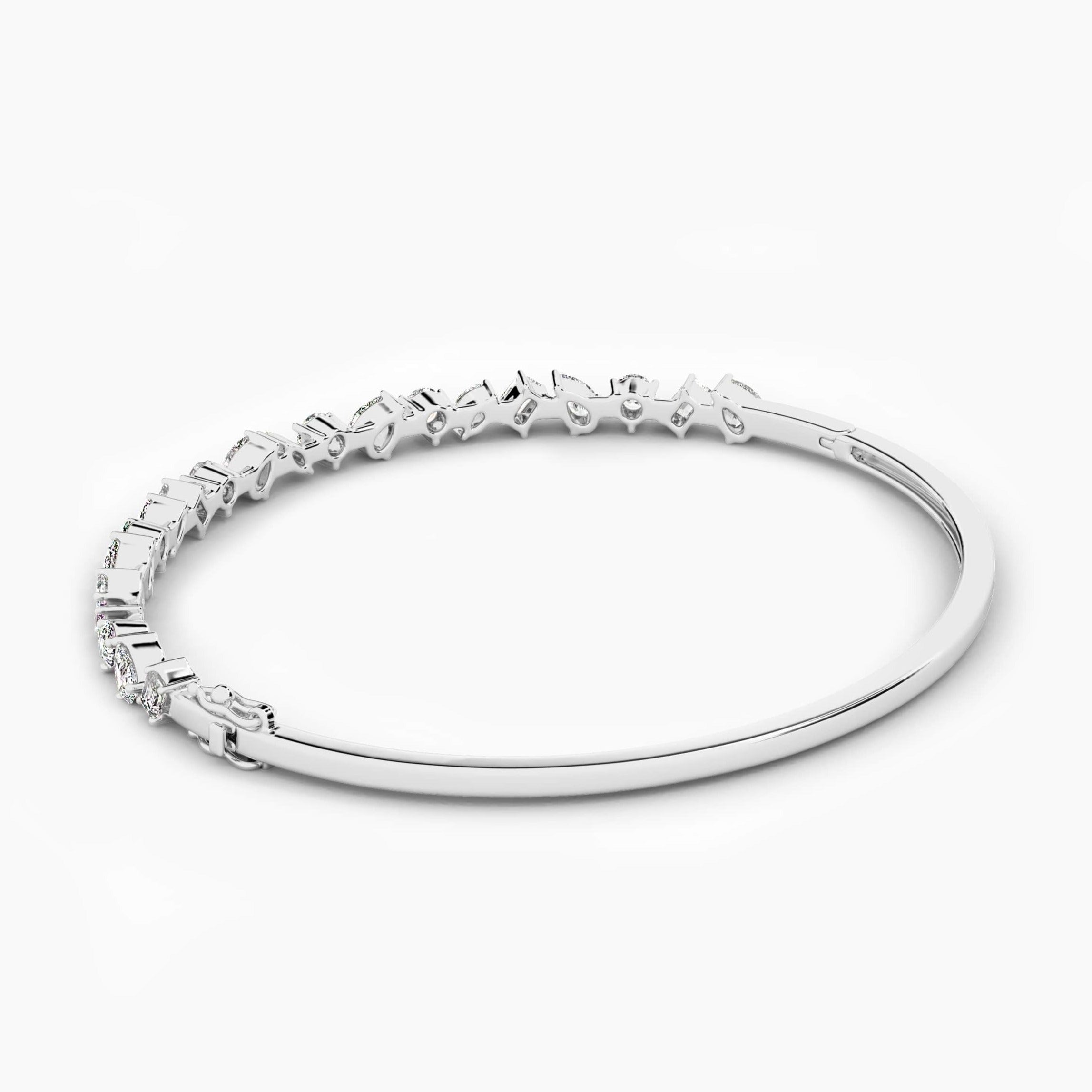 gold and diamond bangle bracelet in white gold