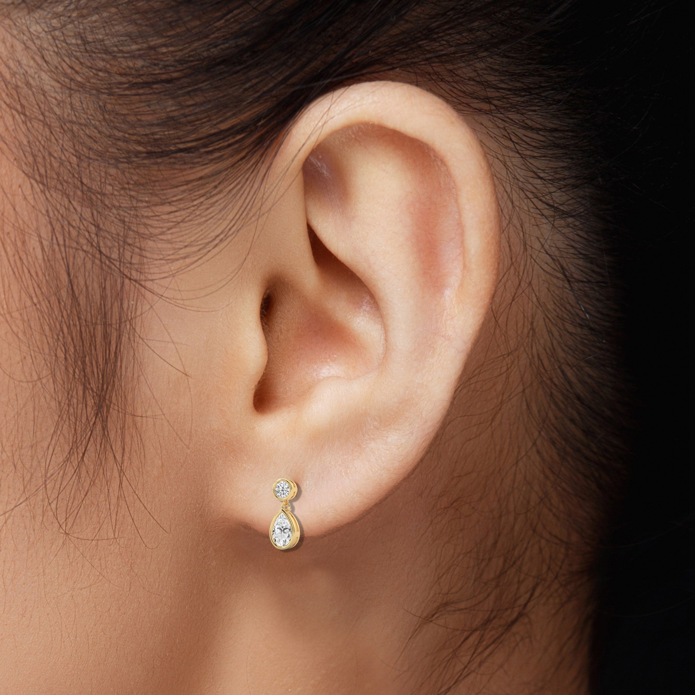 diamond drop earrings on ear