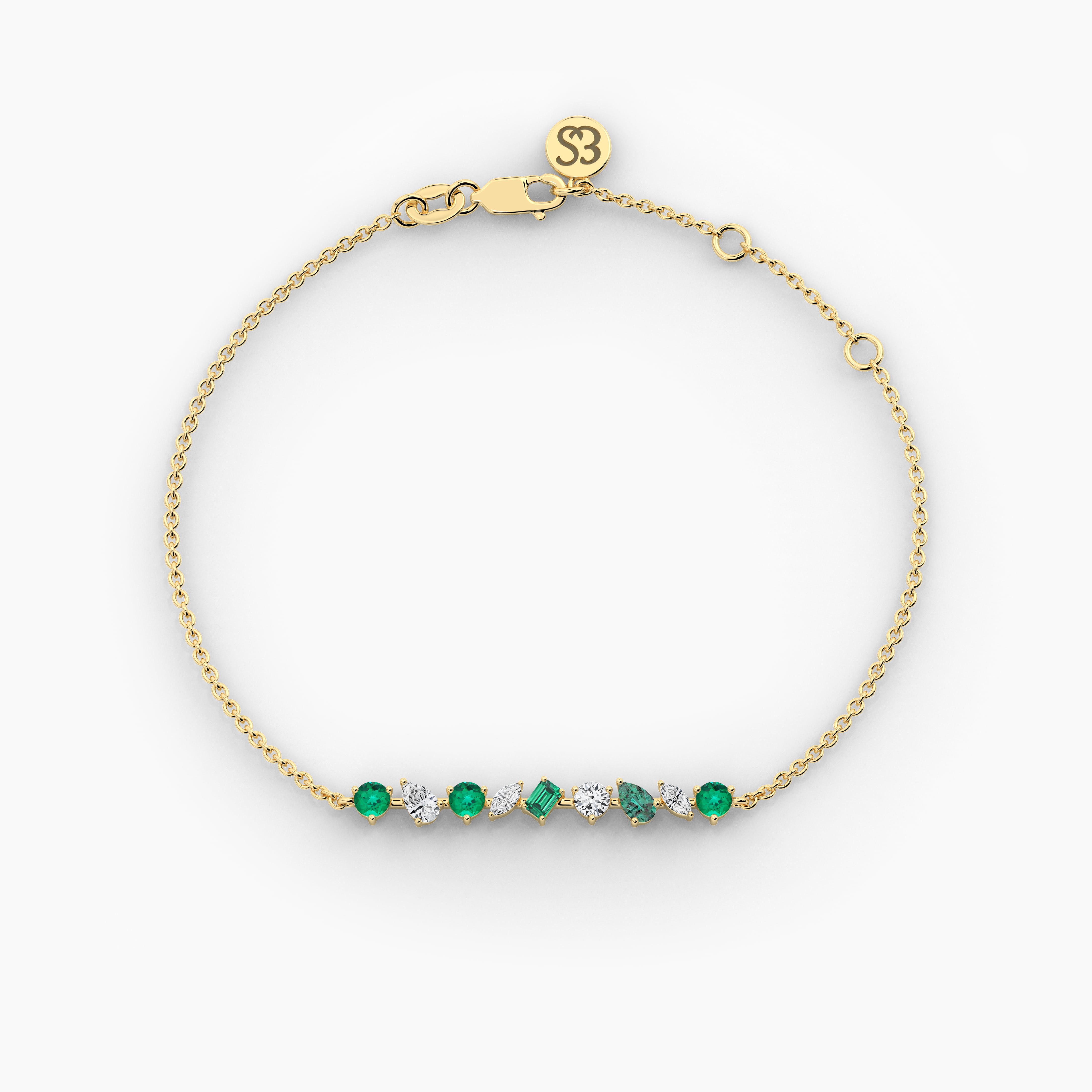 yellow gold emerald and white diamond chain bracelet in multi shape for woman 