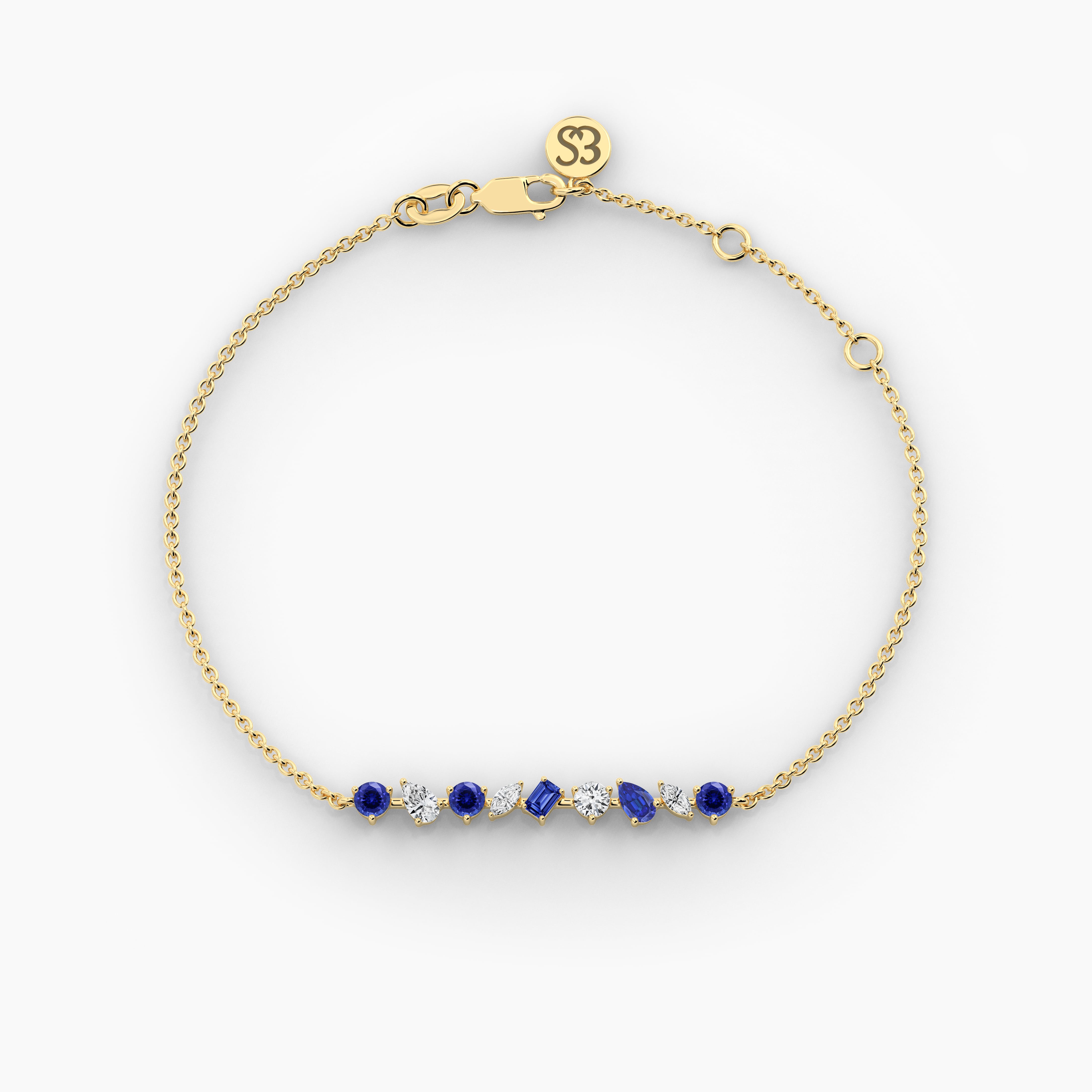 yellow gold chain bracelet in multi shape white and blue sapphire diamond 