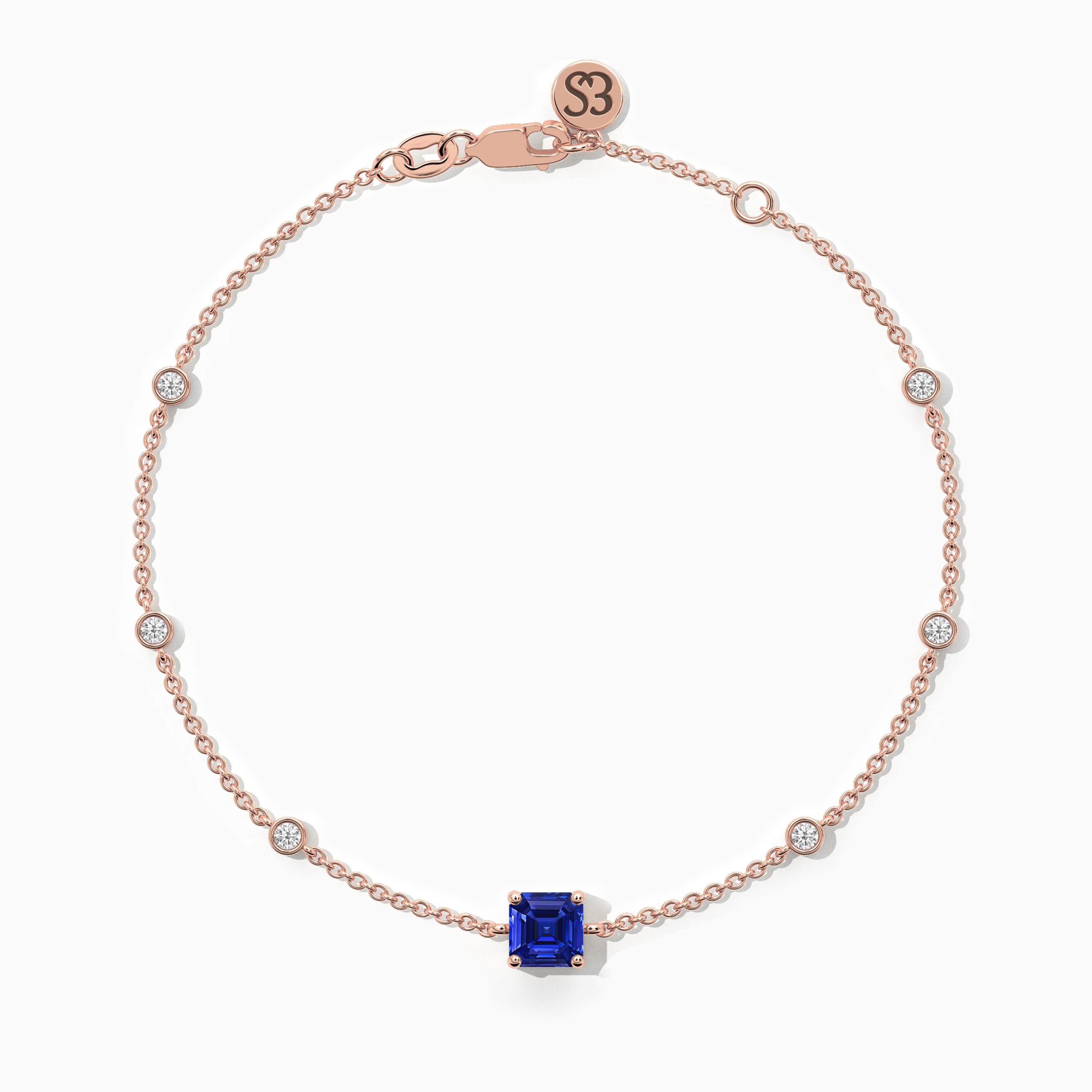 gold bracelet with blue sapphire