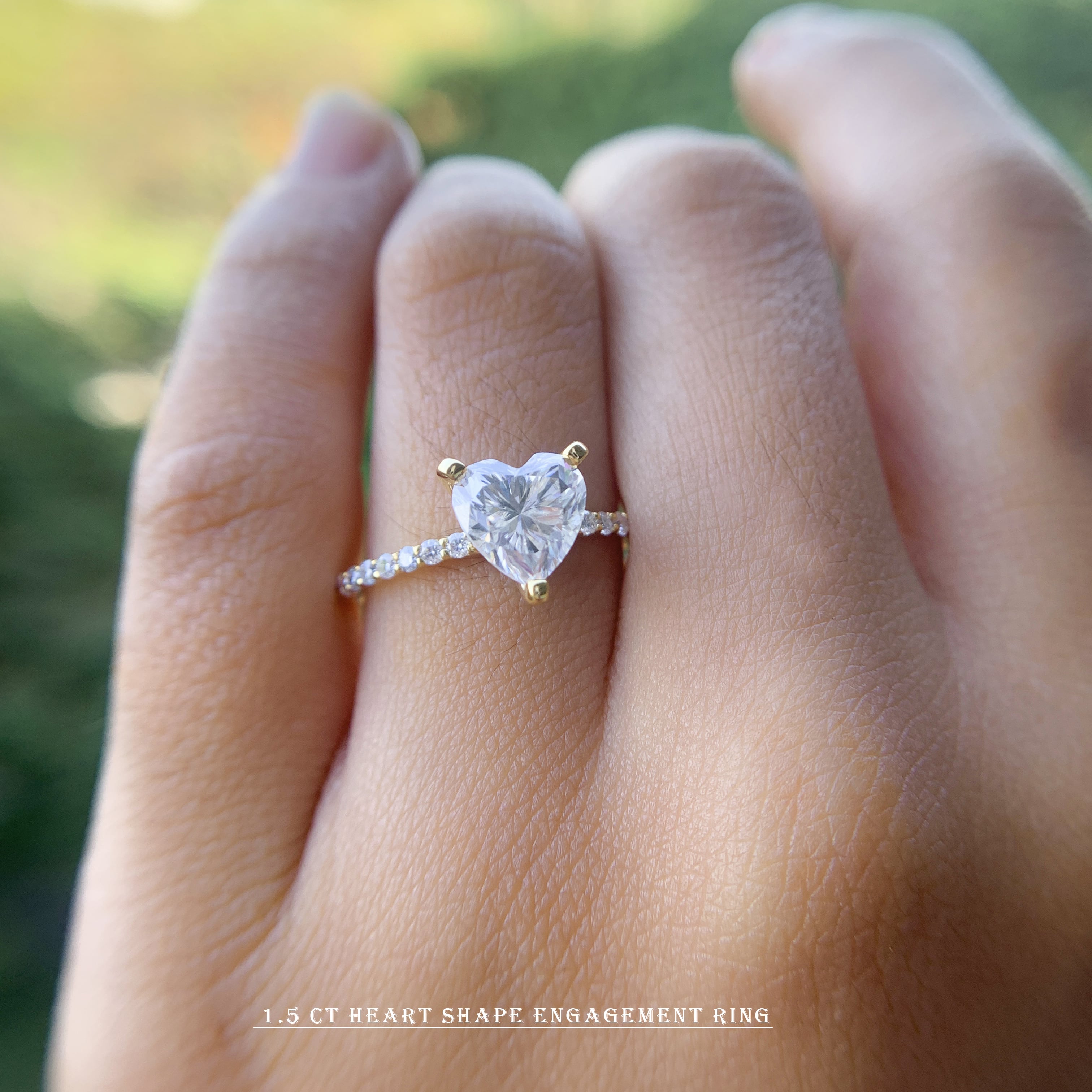 1.5 ct heart shape engagement ring on women hand