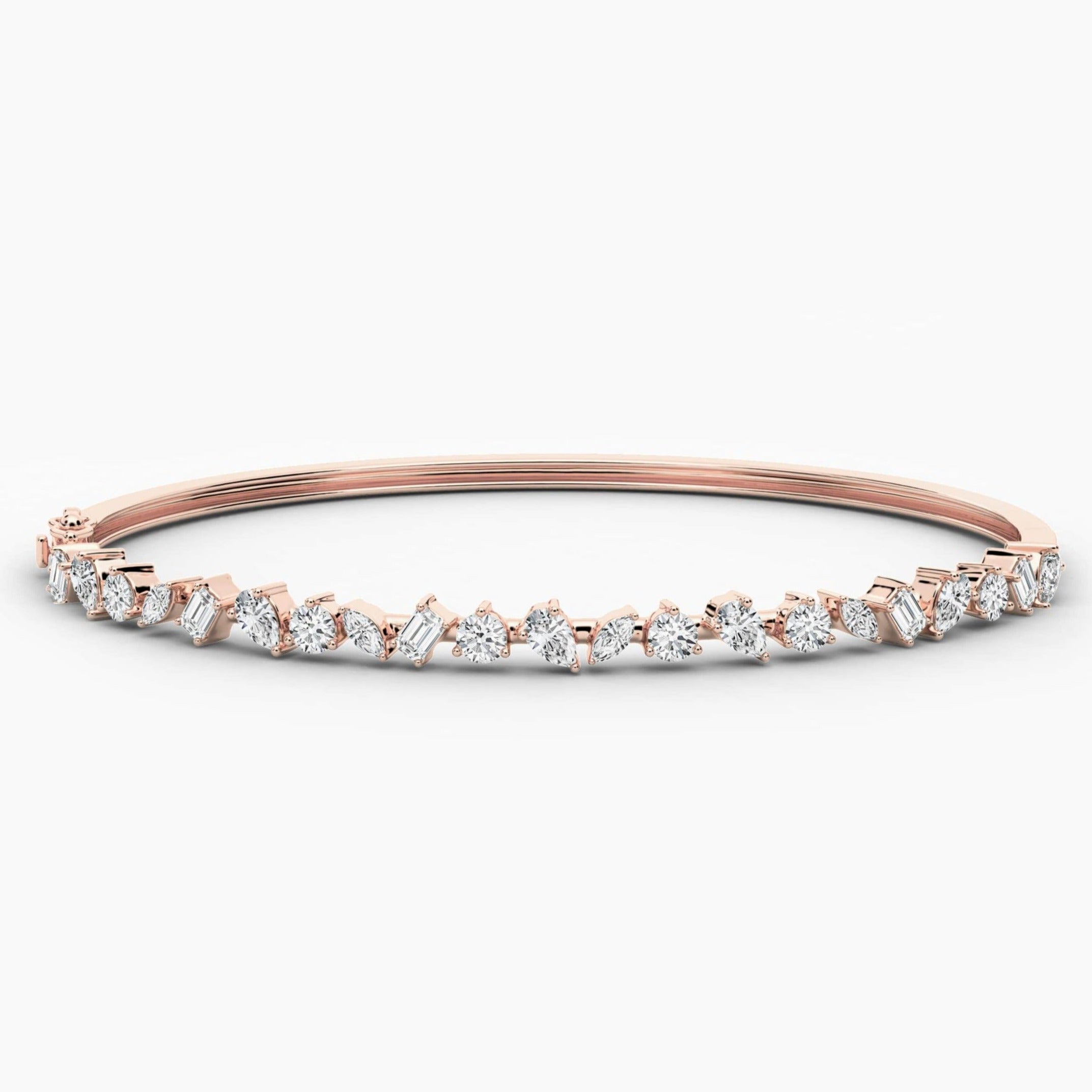 gold and diamond bangle bracelet in rose gold