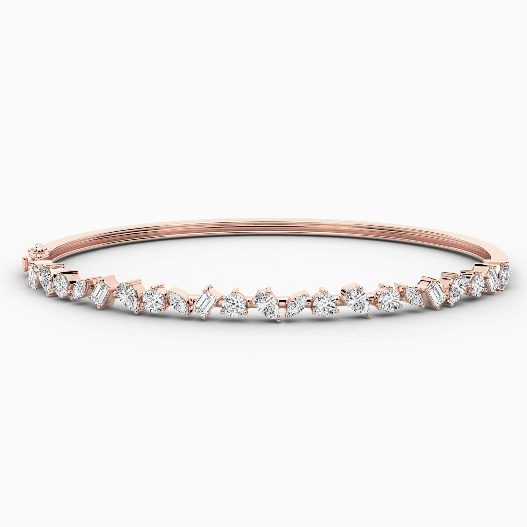 gold and diamond bangle bracelet in rose gold