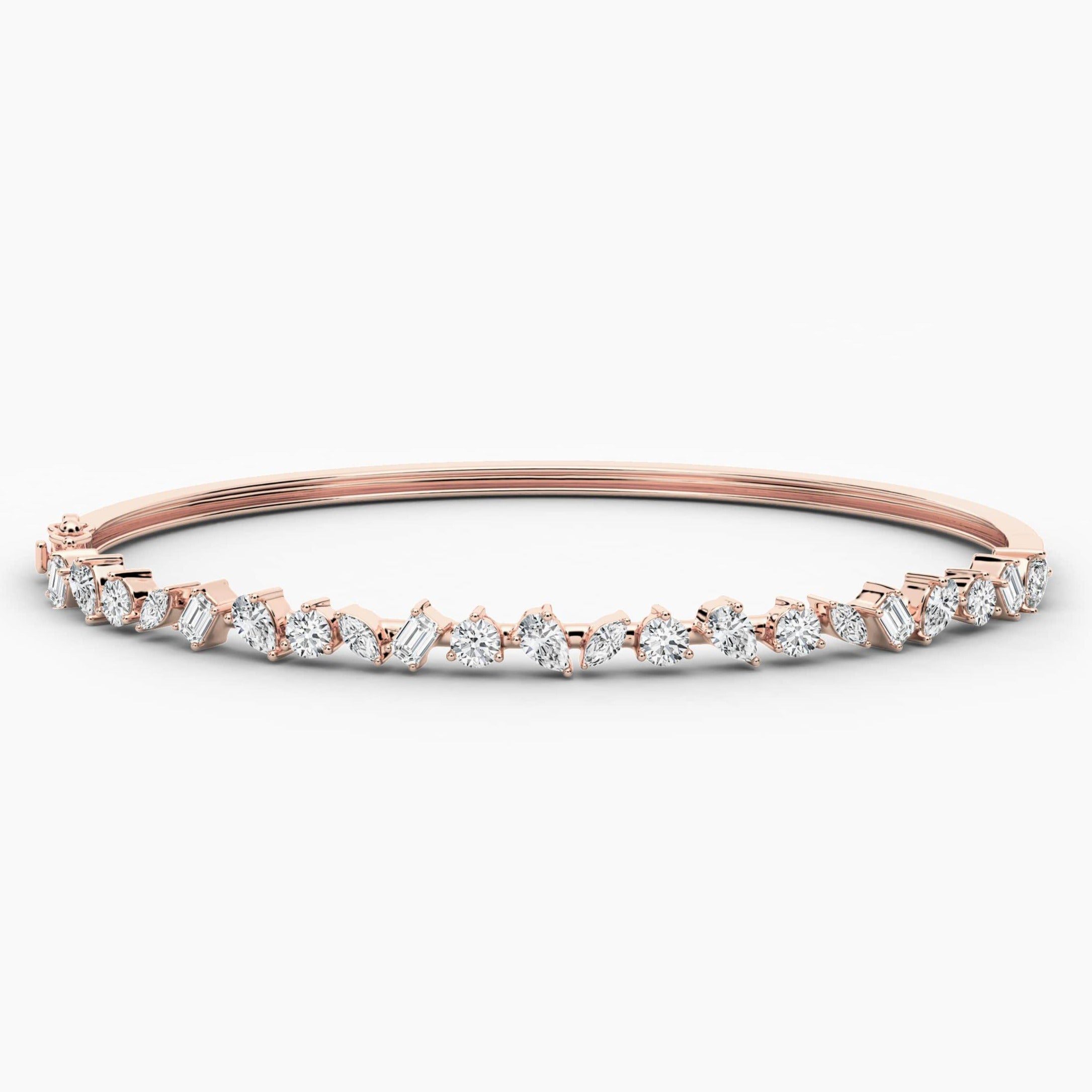 gold and diamond bangle bracelet in rose gold