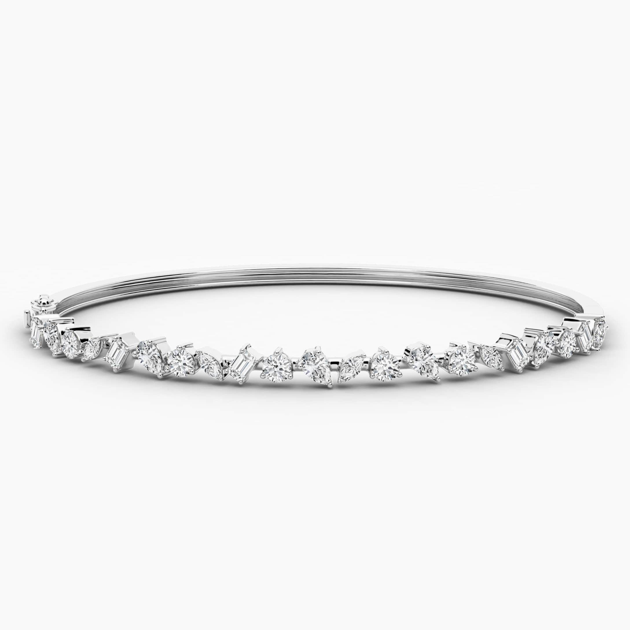 gold and diamond bangle bracelet in white gold