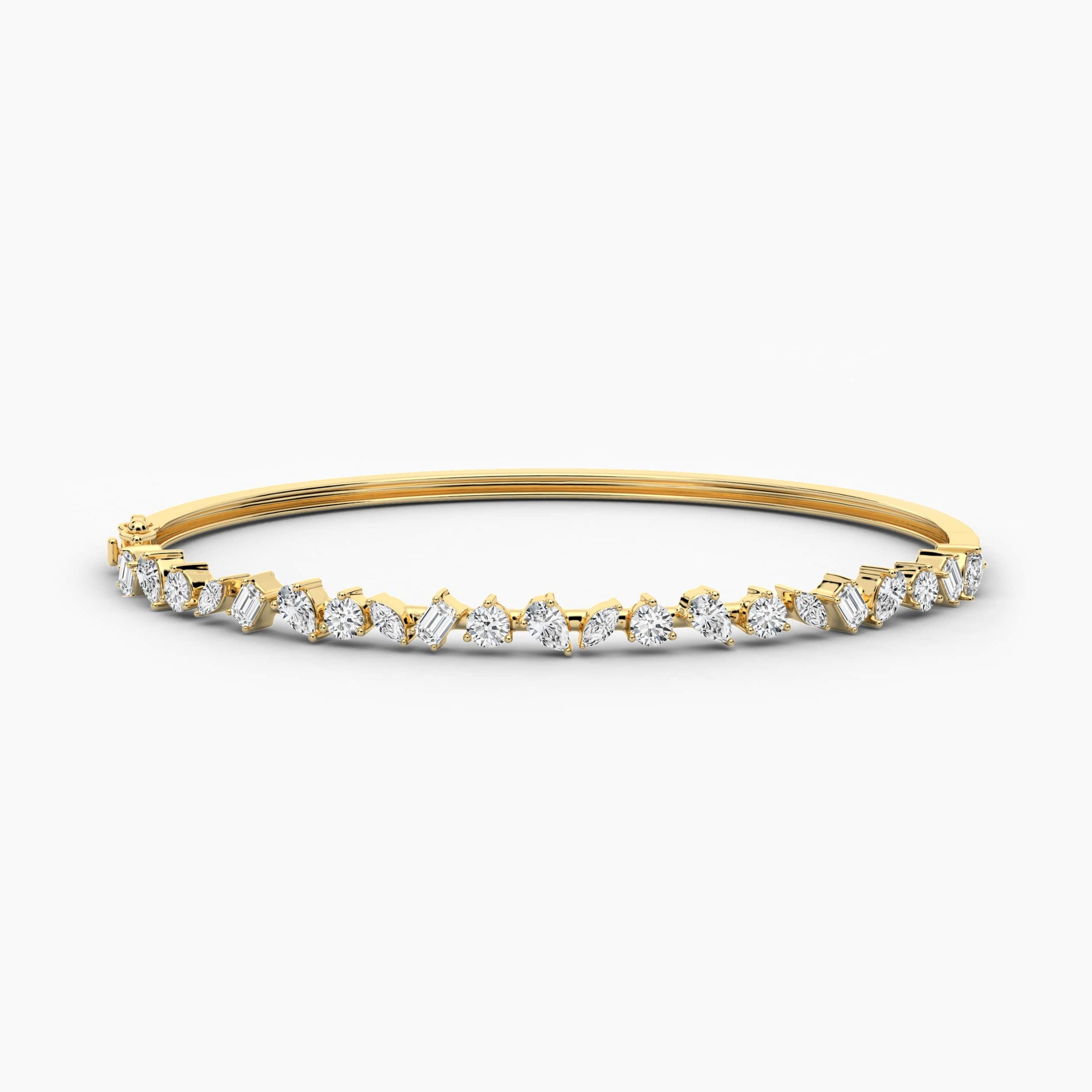 gold and diamond bangle bracelet in yellow gold
