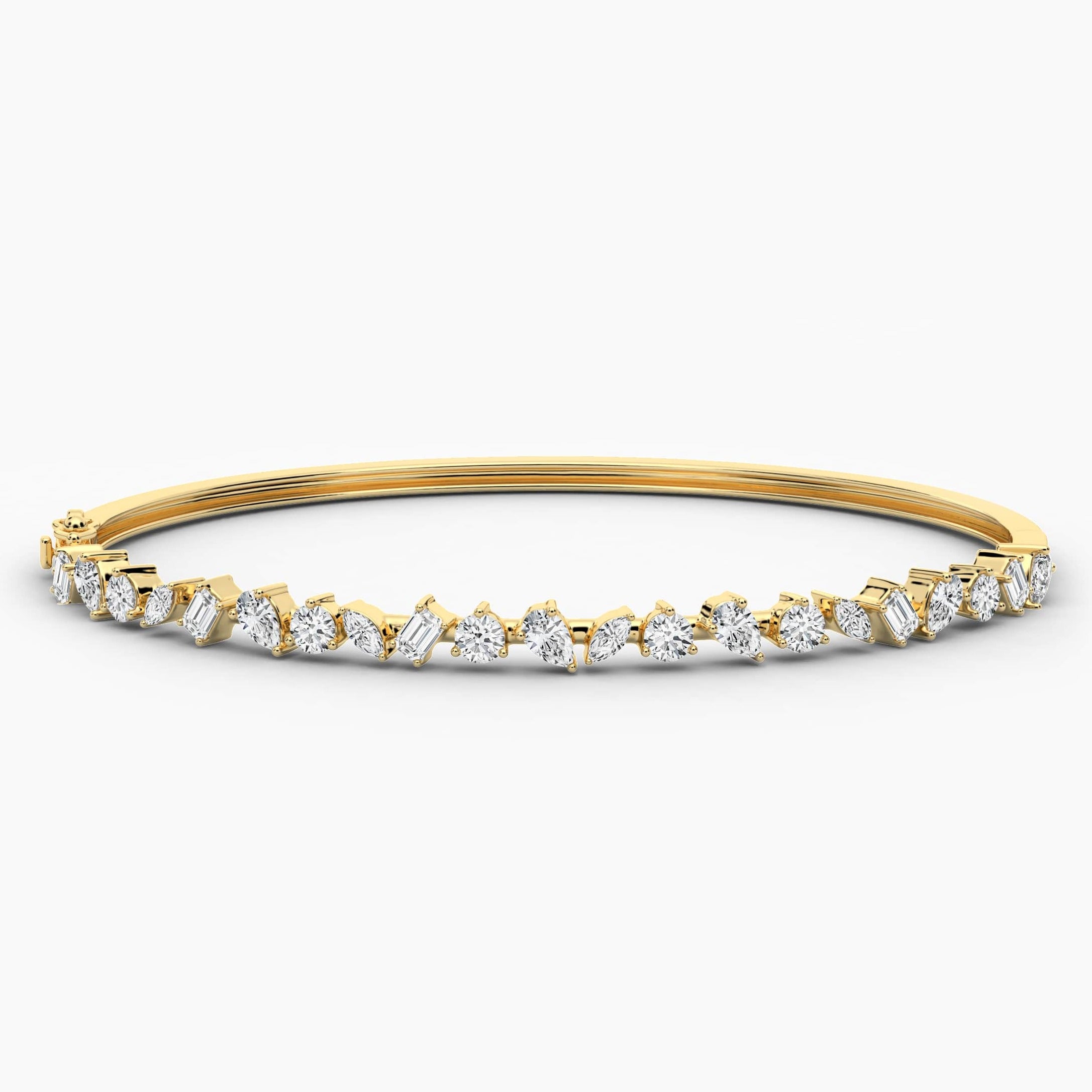 gold and diamond bangle bracelet in yellow gold