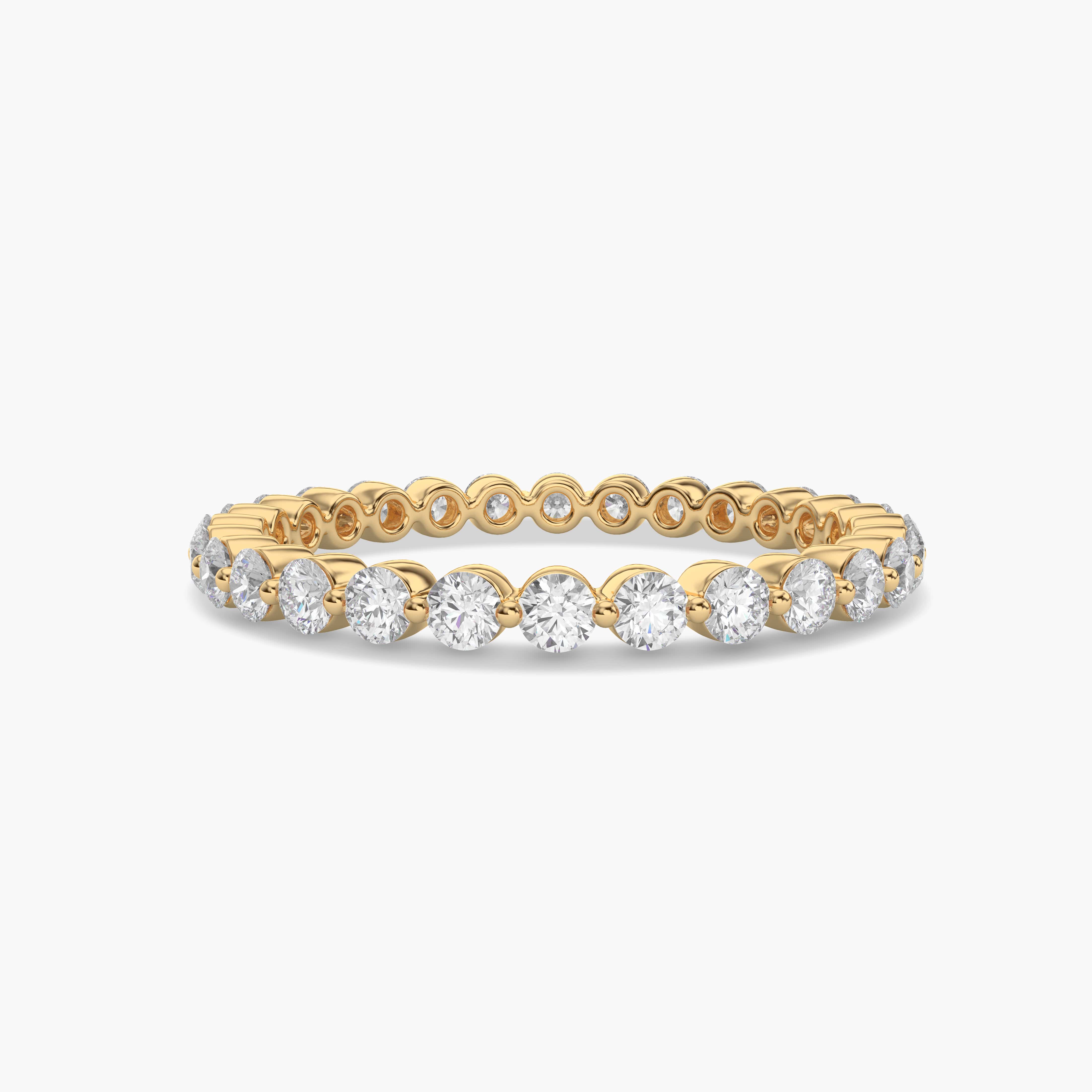 ROUND SHAPE BAR SETTING MOISSANITE ETERNITY BAND IN YELLOW GOLD