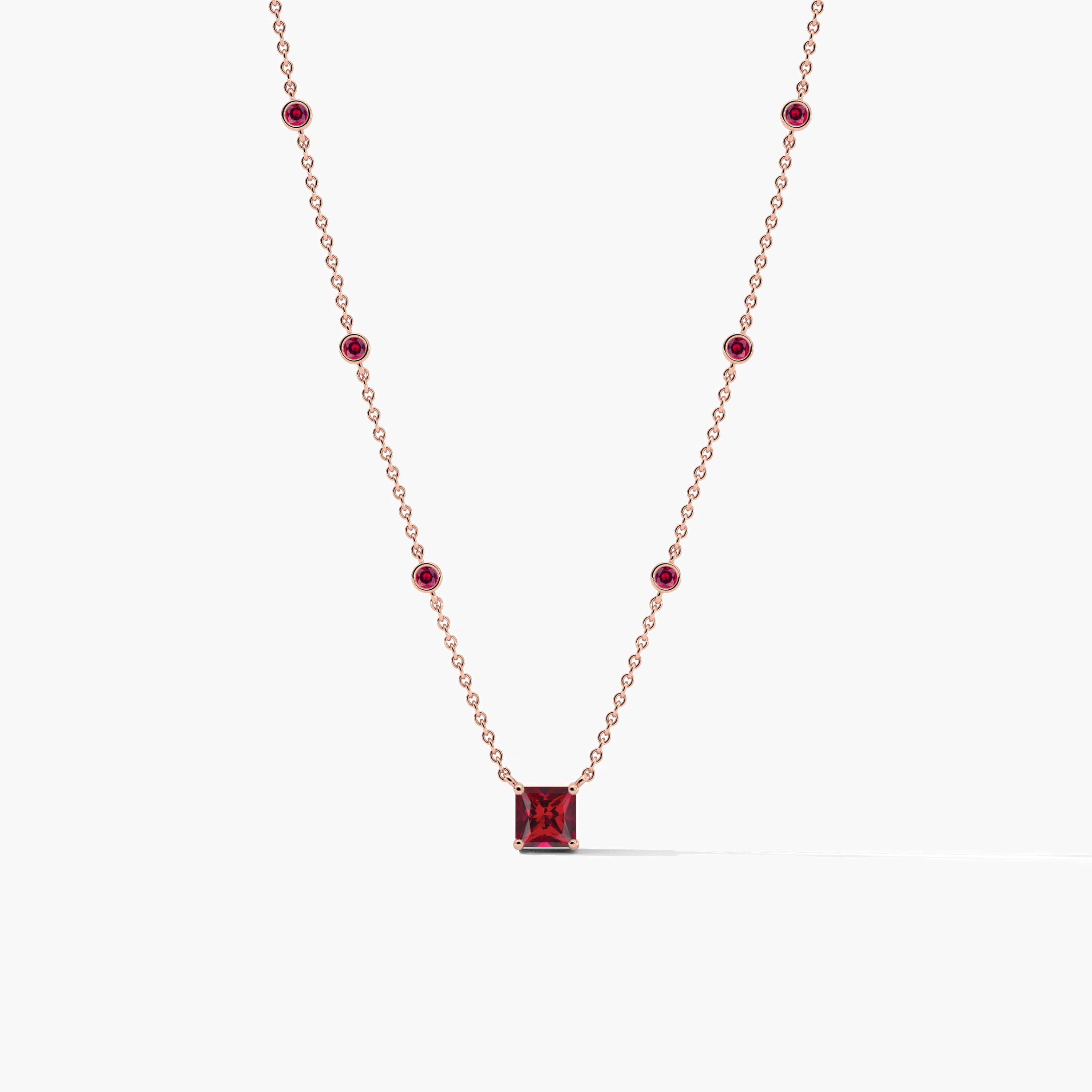 gold heart necklace with ruby