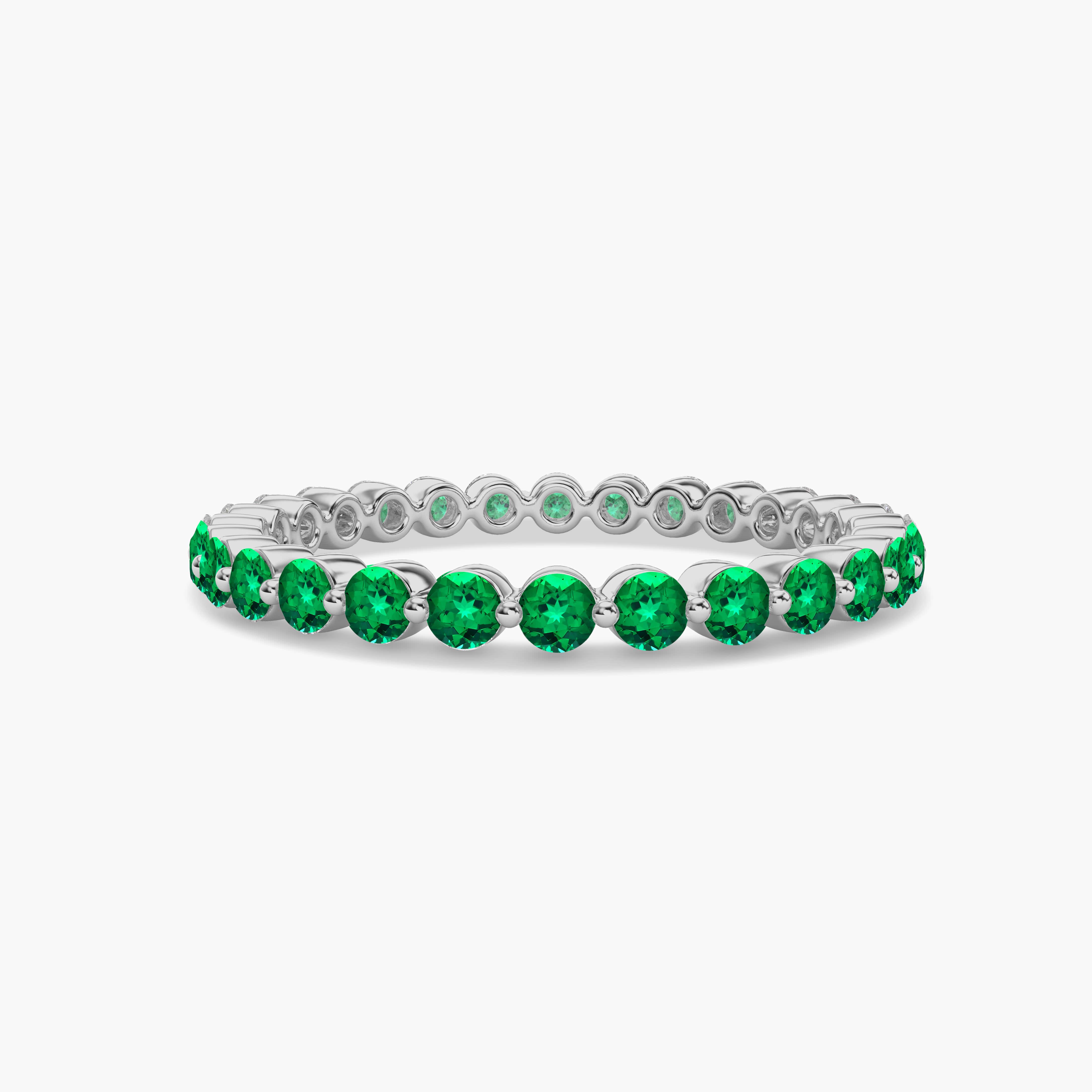 Green Emerald Cut Eternity Wedding Band  In Round Cut Ring For Woman In White Gold 