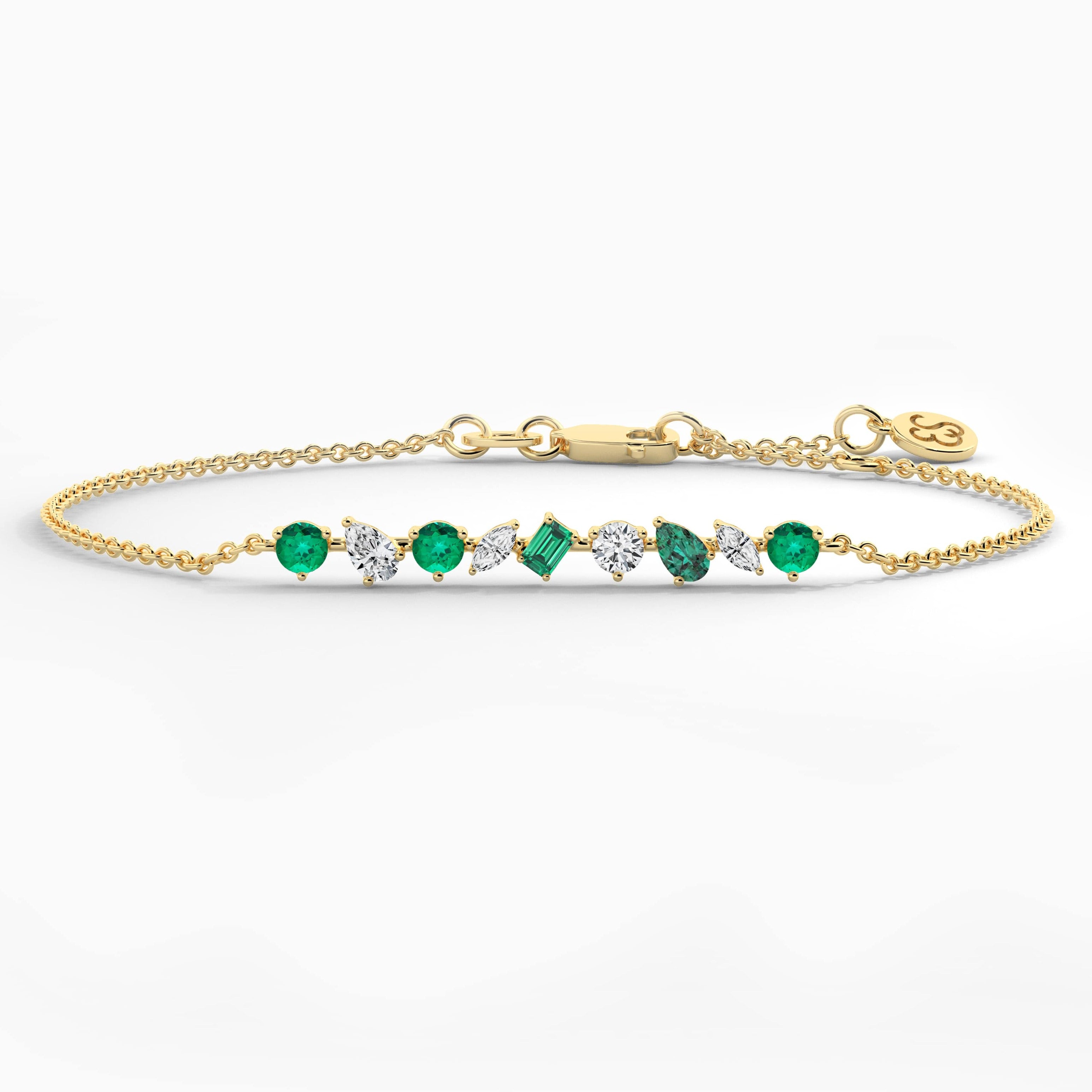 Multi Shape Emerald And White Diamond Chain Bracelet In Yellow Gold