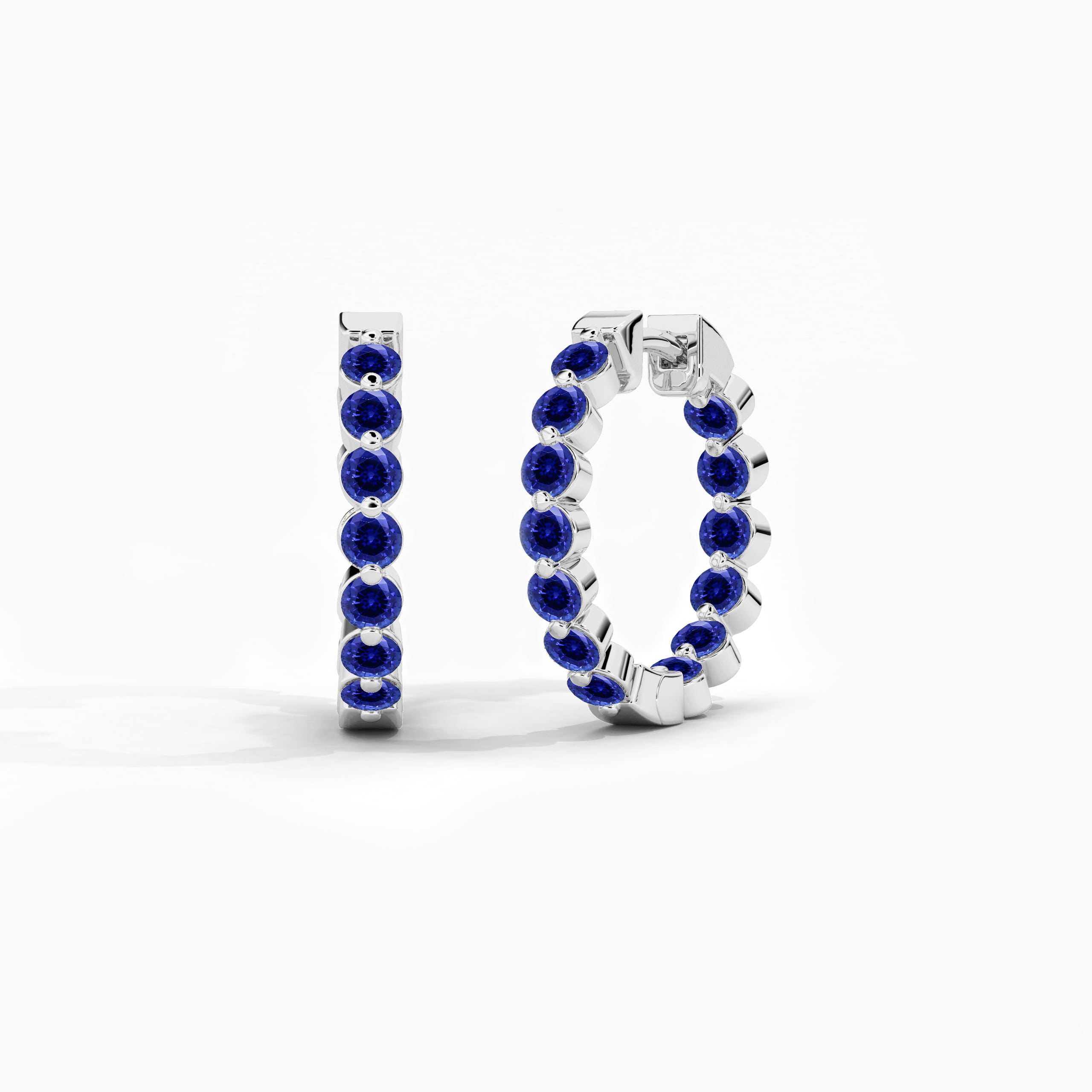 blue sapphire drop earrings in white gold