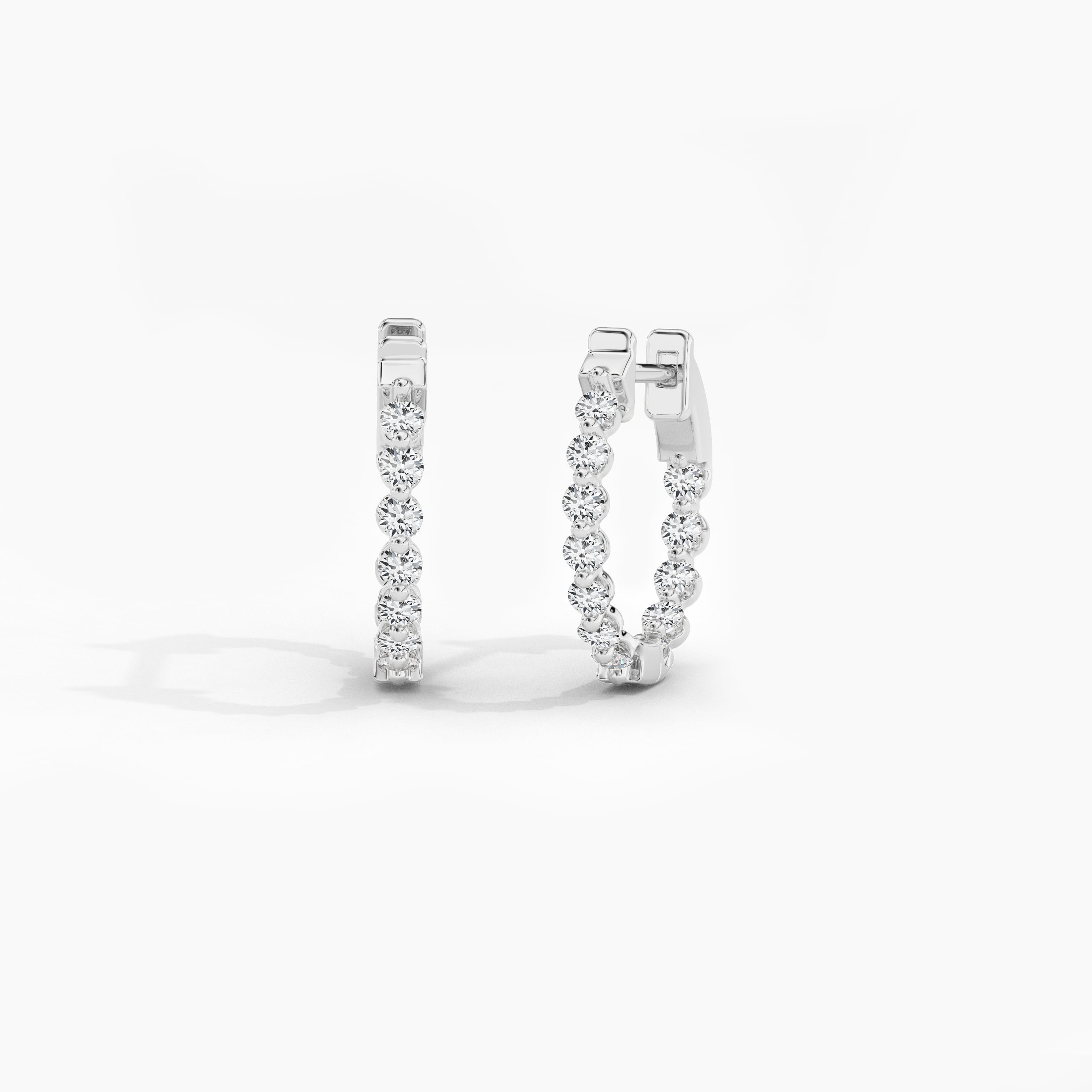 14k White Gold hoops with diamonds