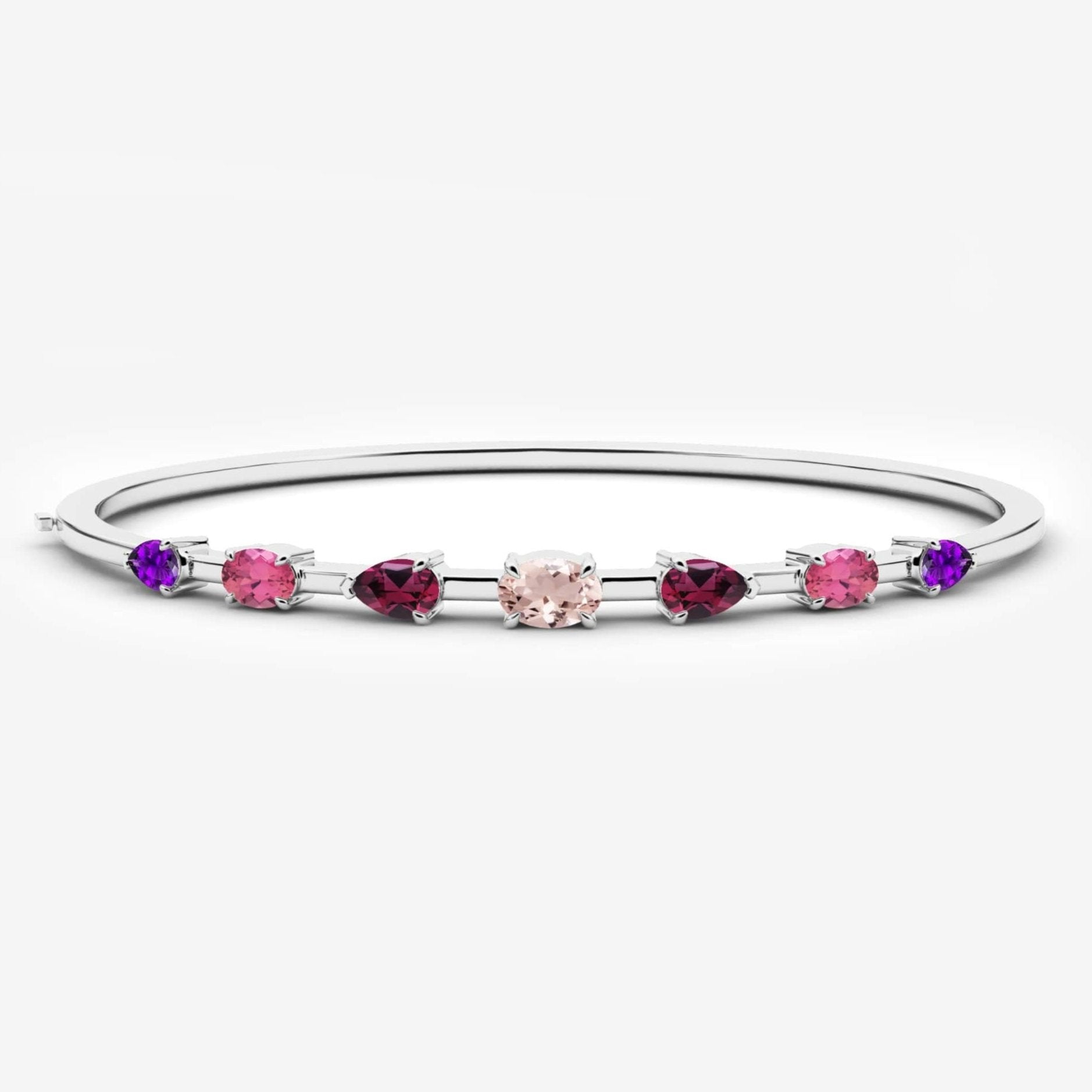 White gold gemstone bangle bracelet with cluster setting