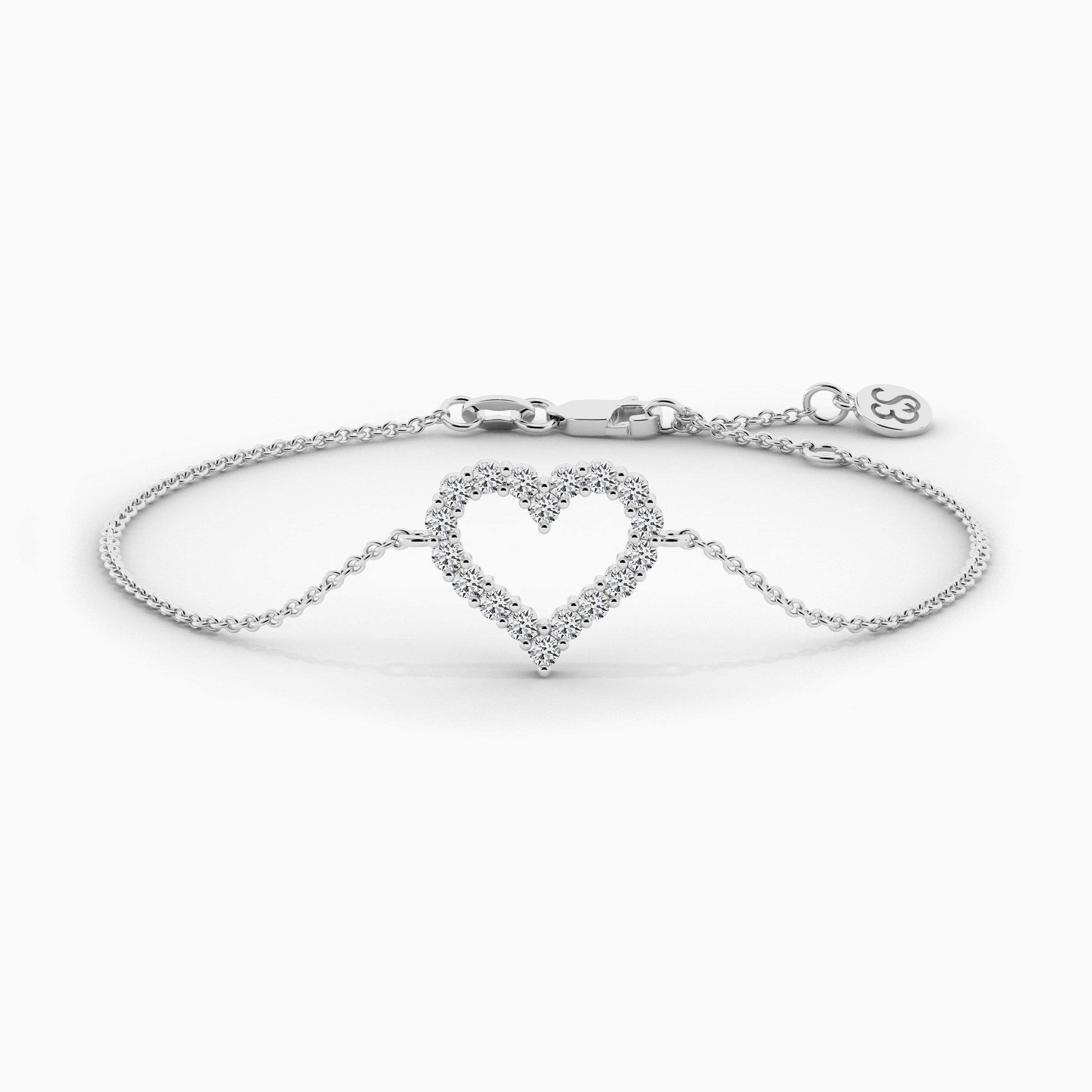 gold diamond heart bracelet in white gold