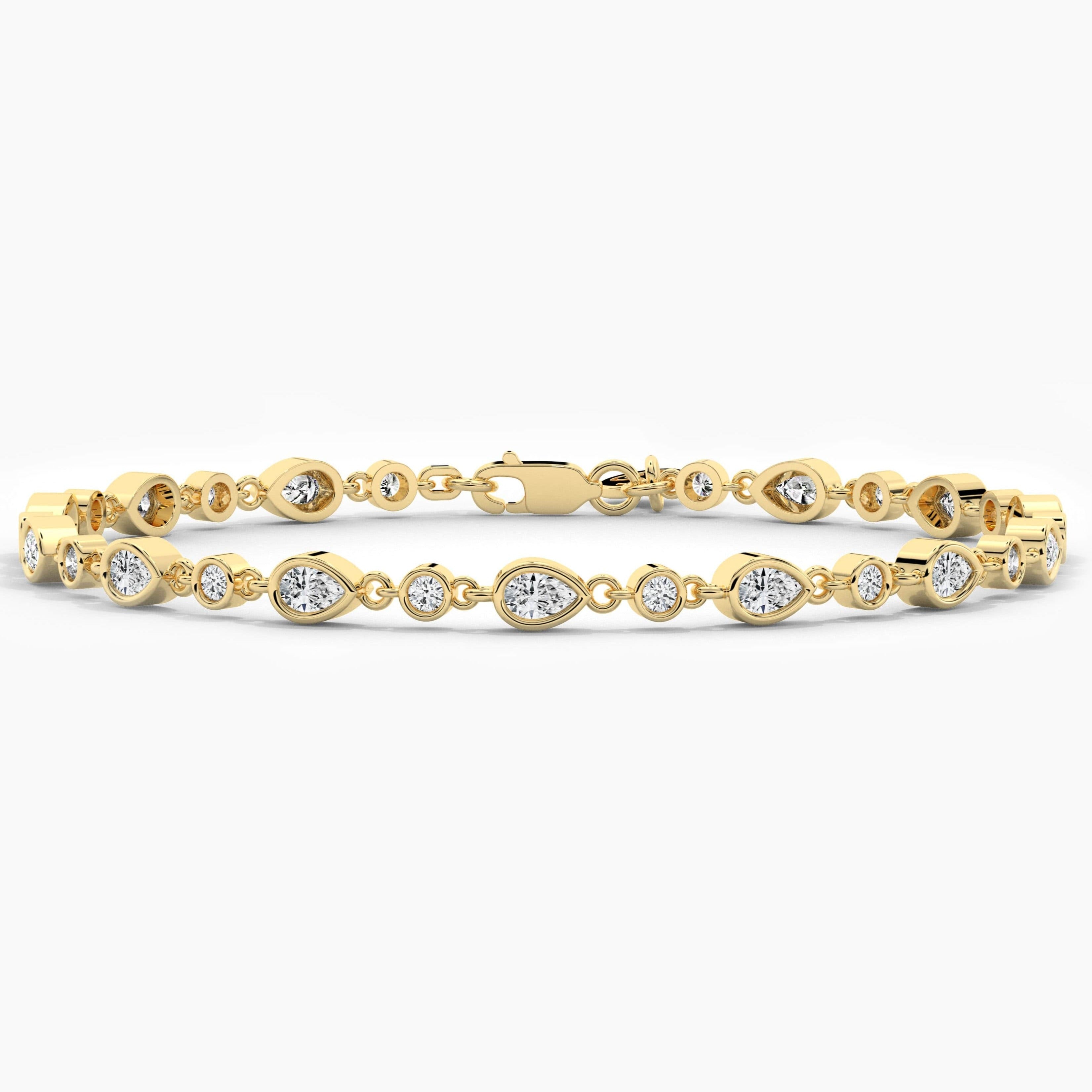 Pear And Round Moissanite Diamond Bracelet In Yellow Gold 