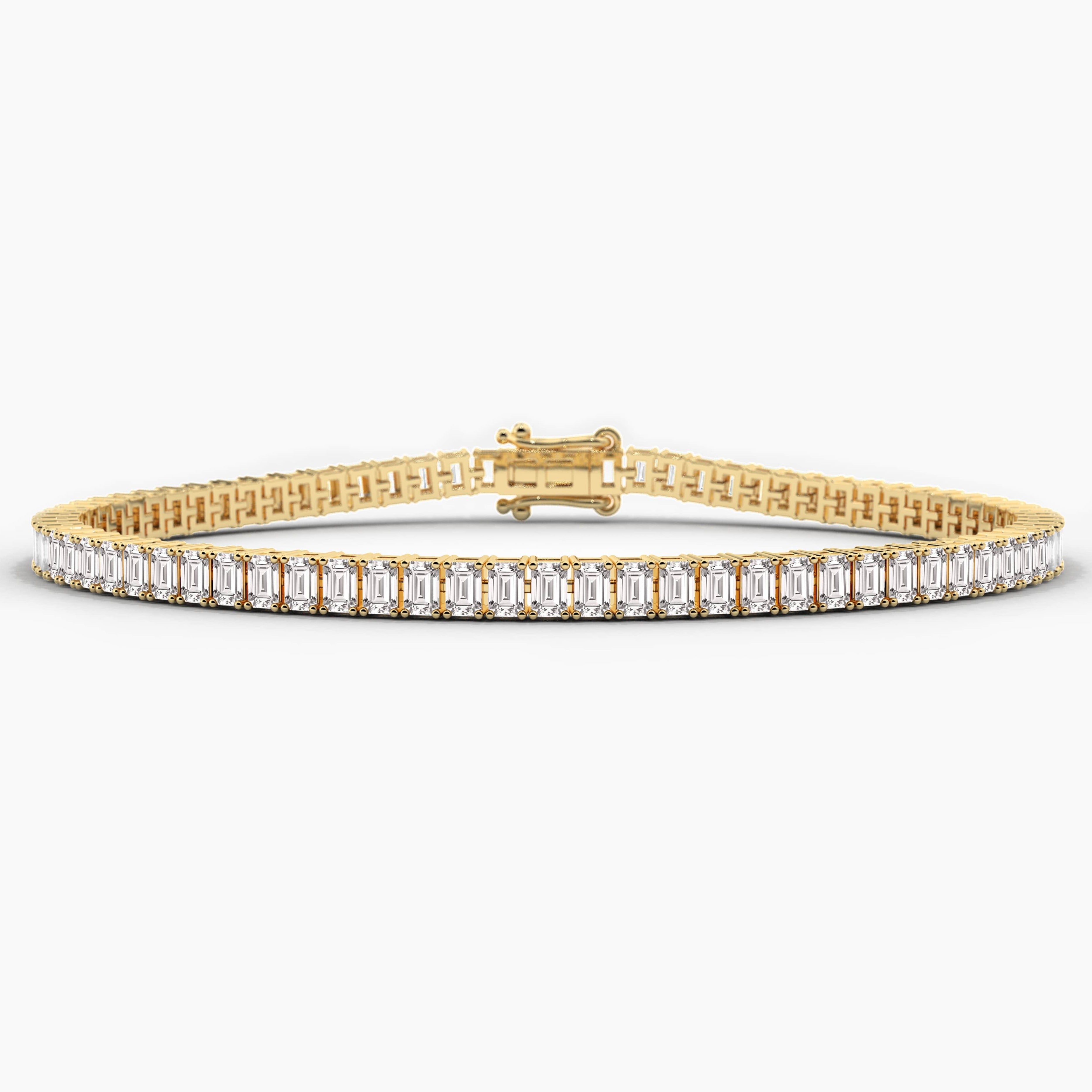 yellow gold emerald shape tennis bracelet 