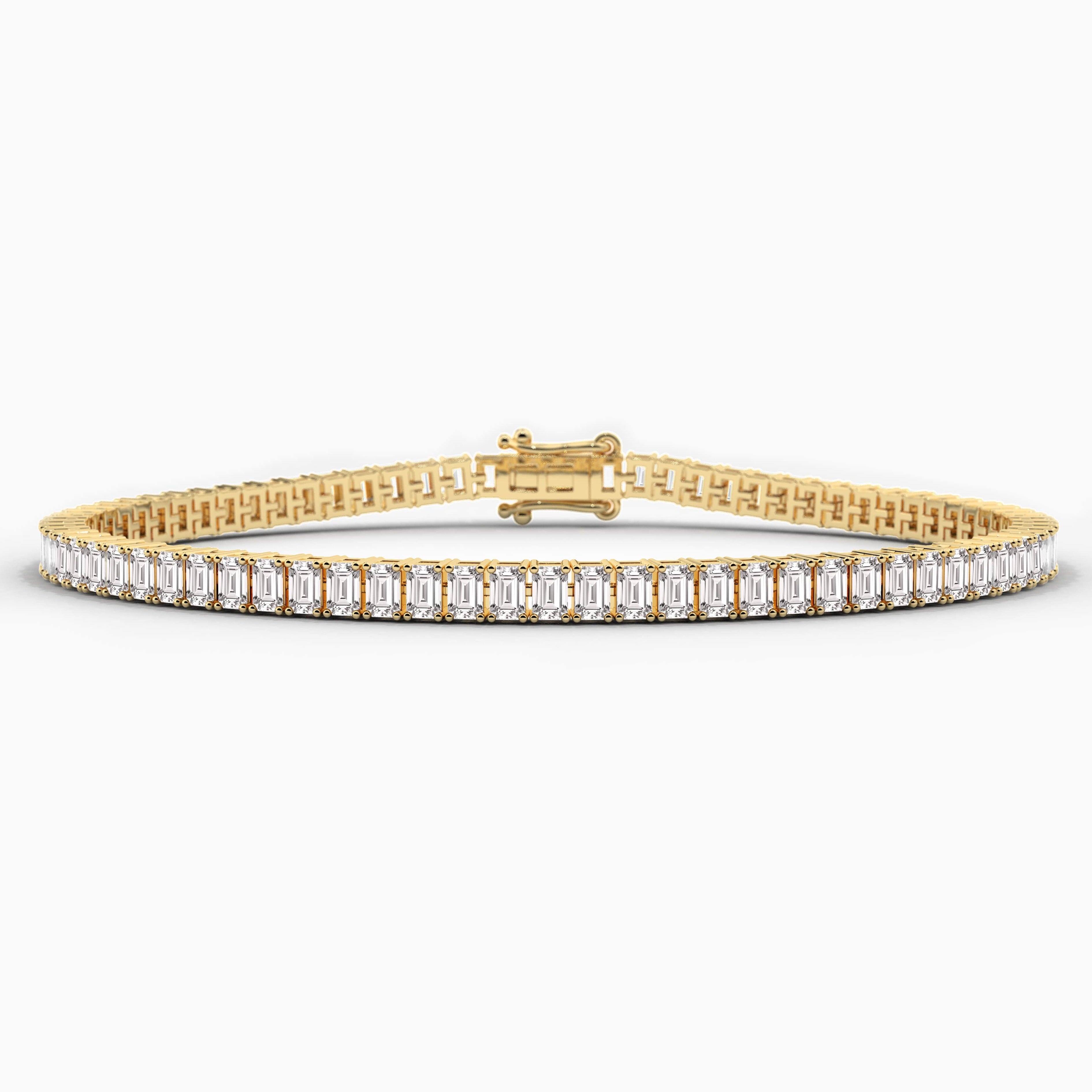 yellow gold emerald shape tennis bracelet 