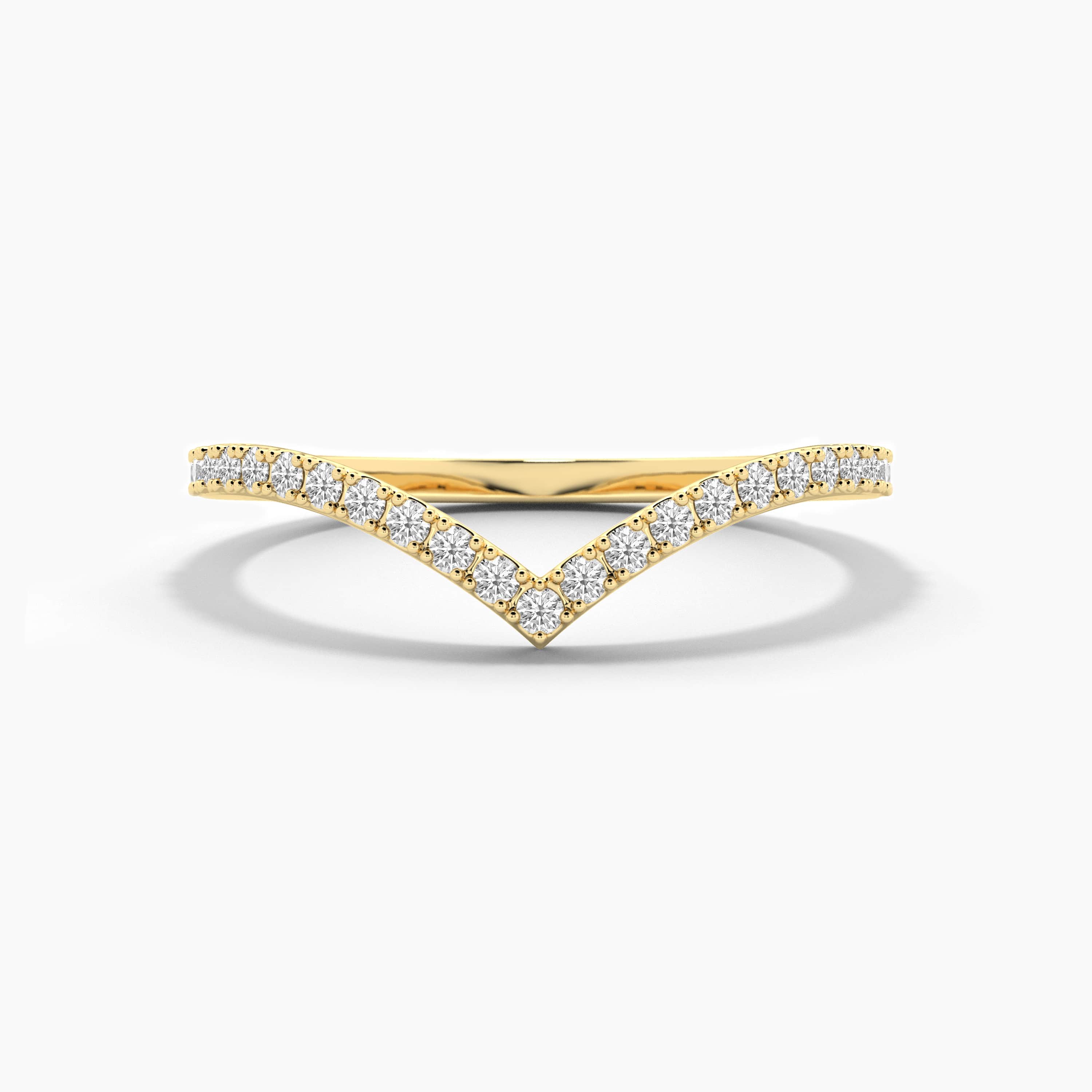Round cut diamond curved ring in yellow gold 