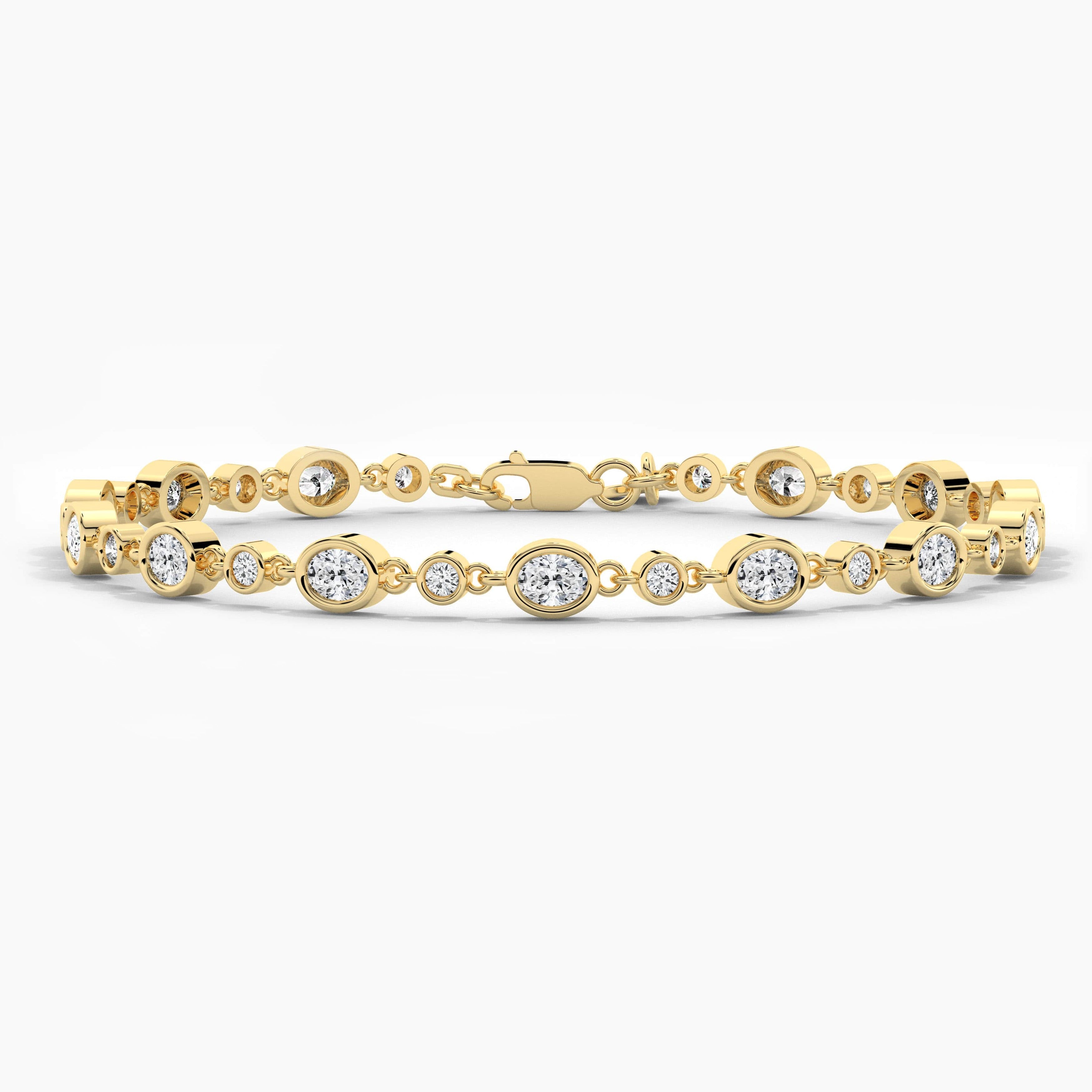Oval And Round Cut Diamond Bracelet In Yellow Gold 