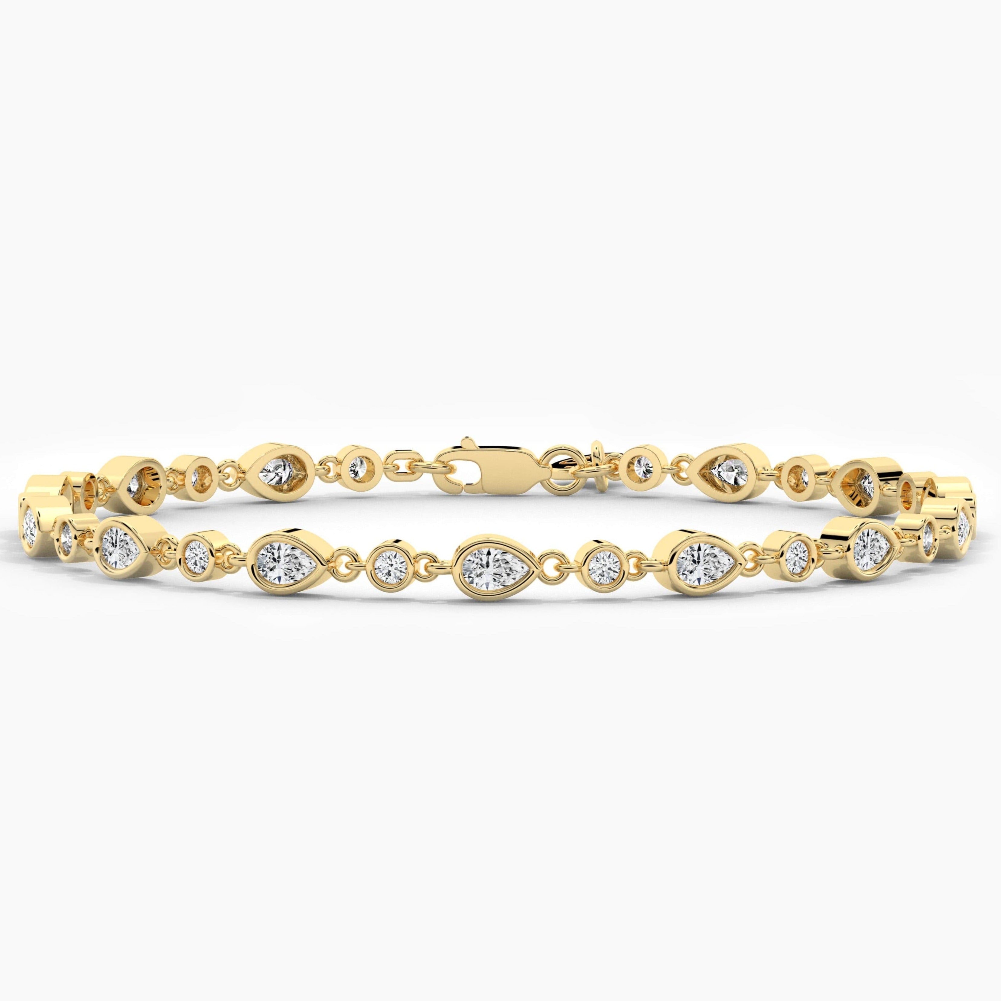 Pear And Round Moissanite Diamond Bracelet In Yellow Gold 