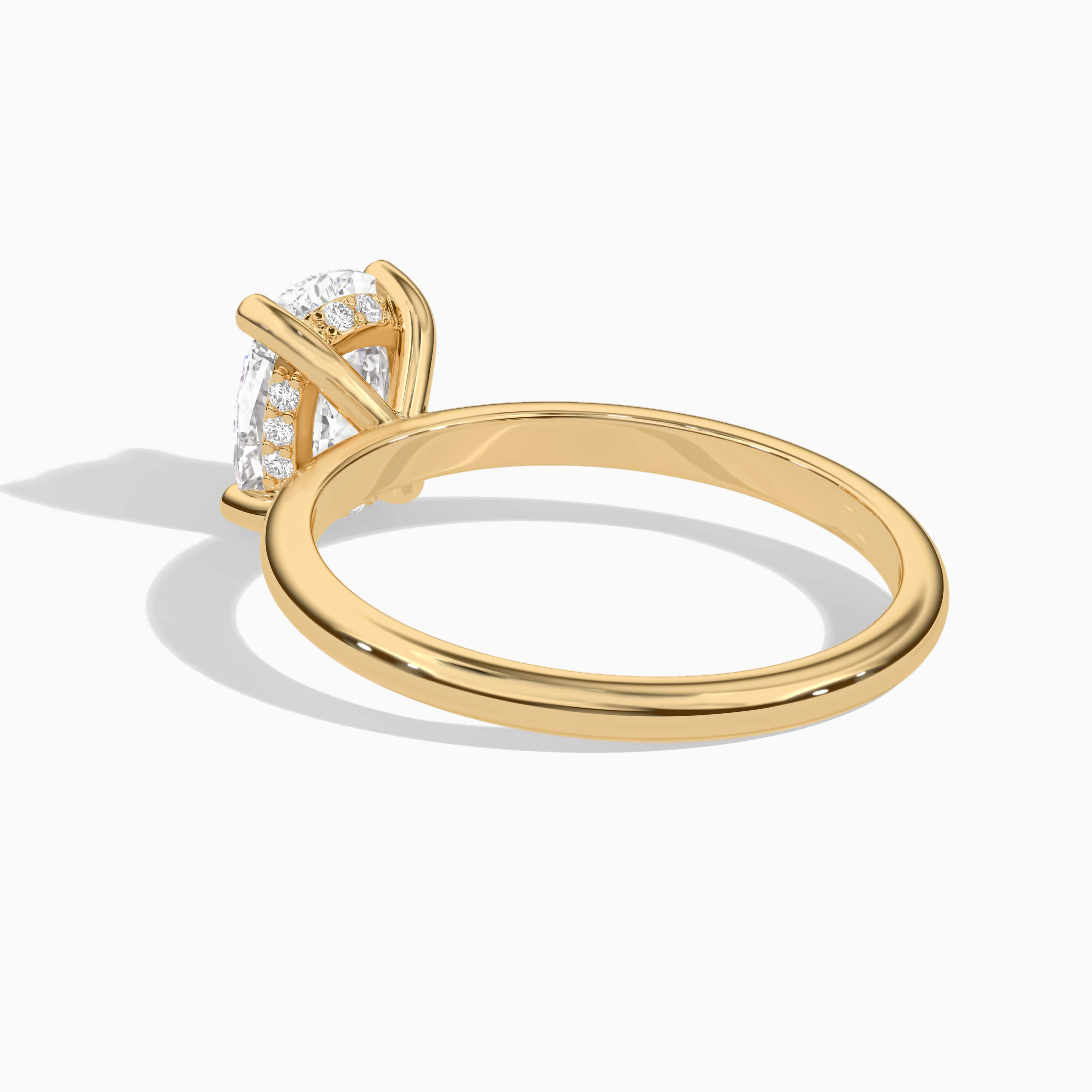 elongated cushion engagement ring yellow gold
