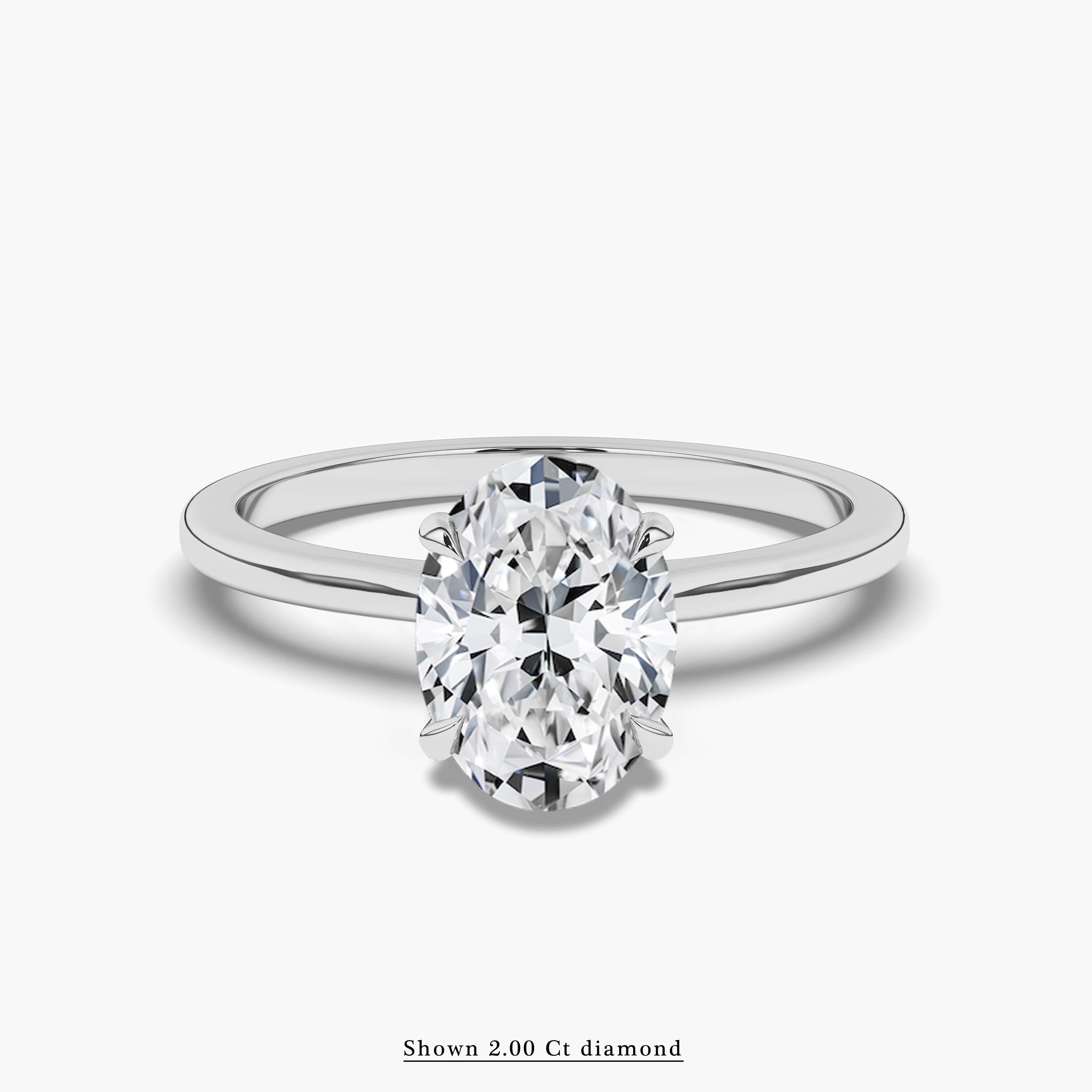 Oval Solitaire Cathedral Setting Engagement Ring