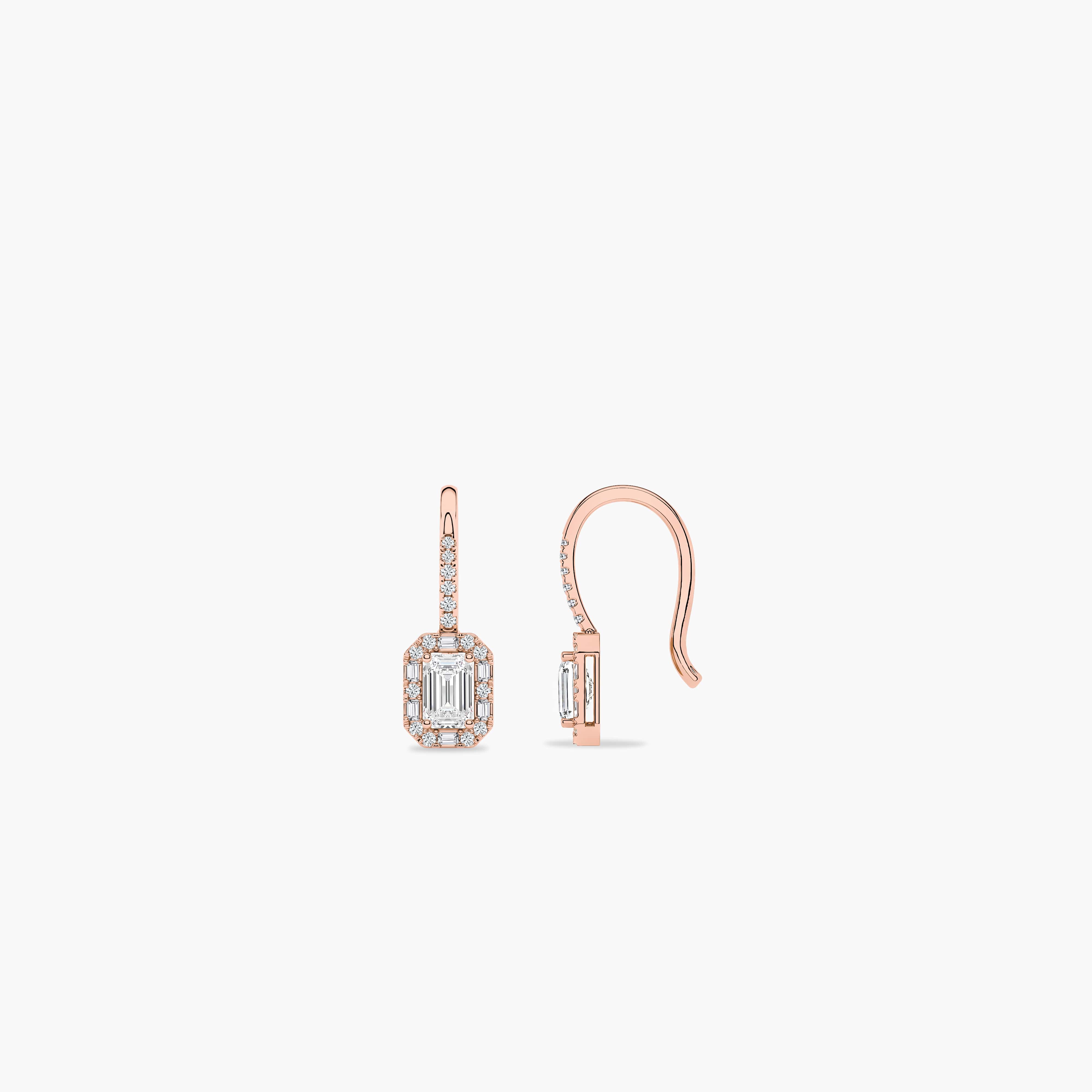 a pair of gold and diamond earrings