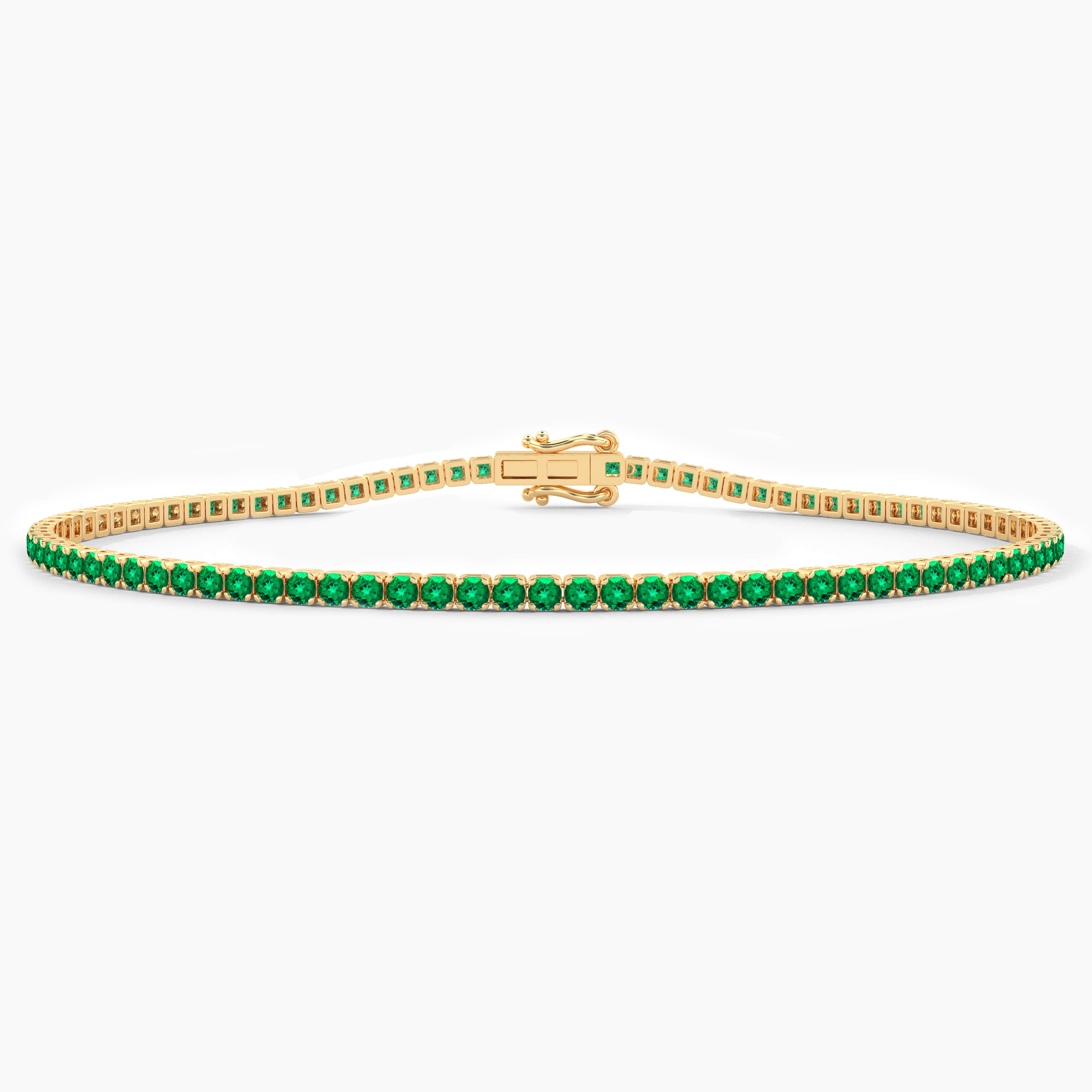 yellow gold emerald diamond tennis bracelet 