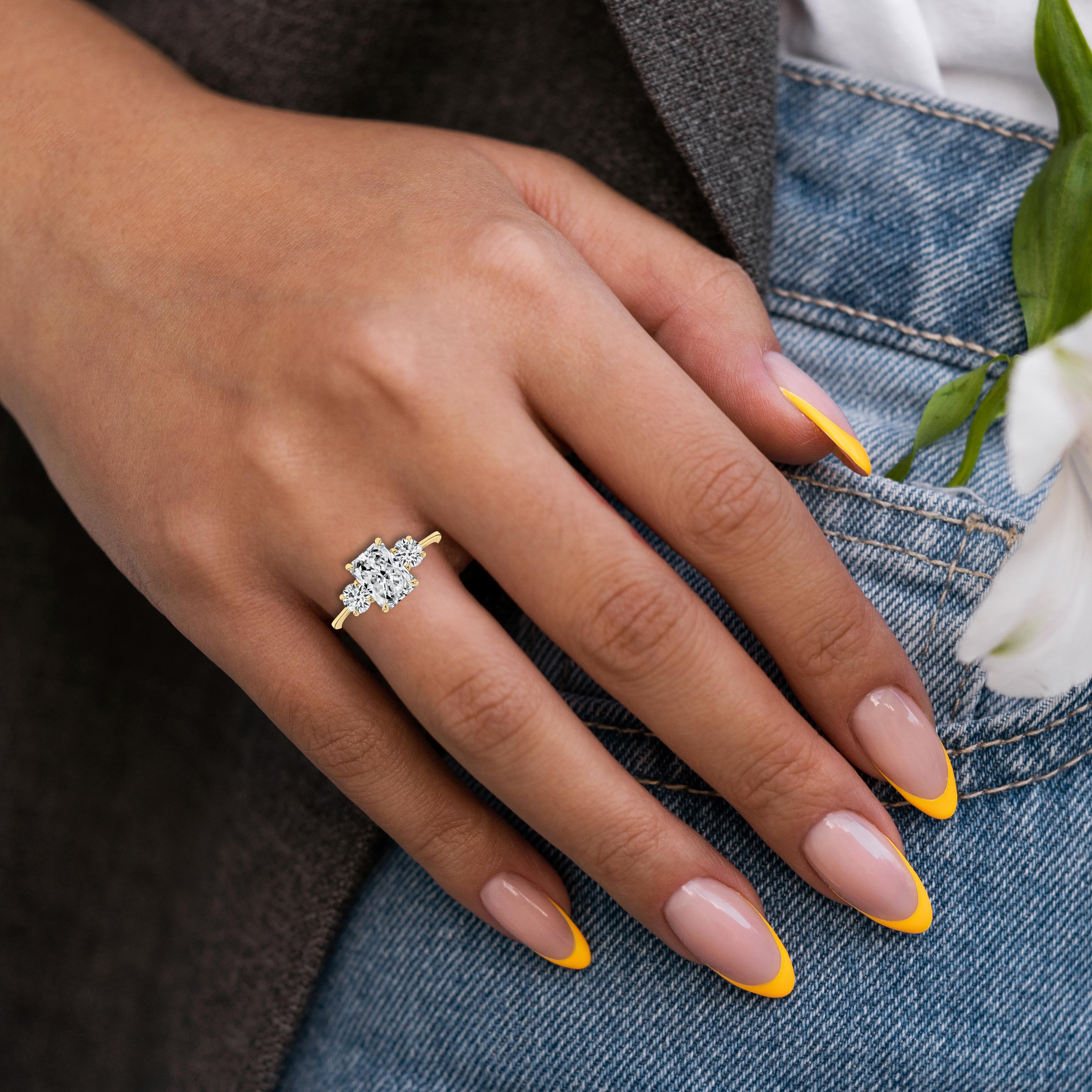 Radiant Cut Three Stone Engagement Ring With Two Round Cut Side Stones