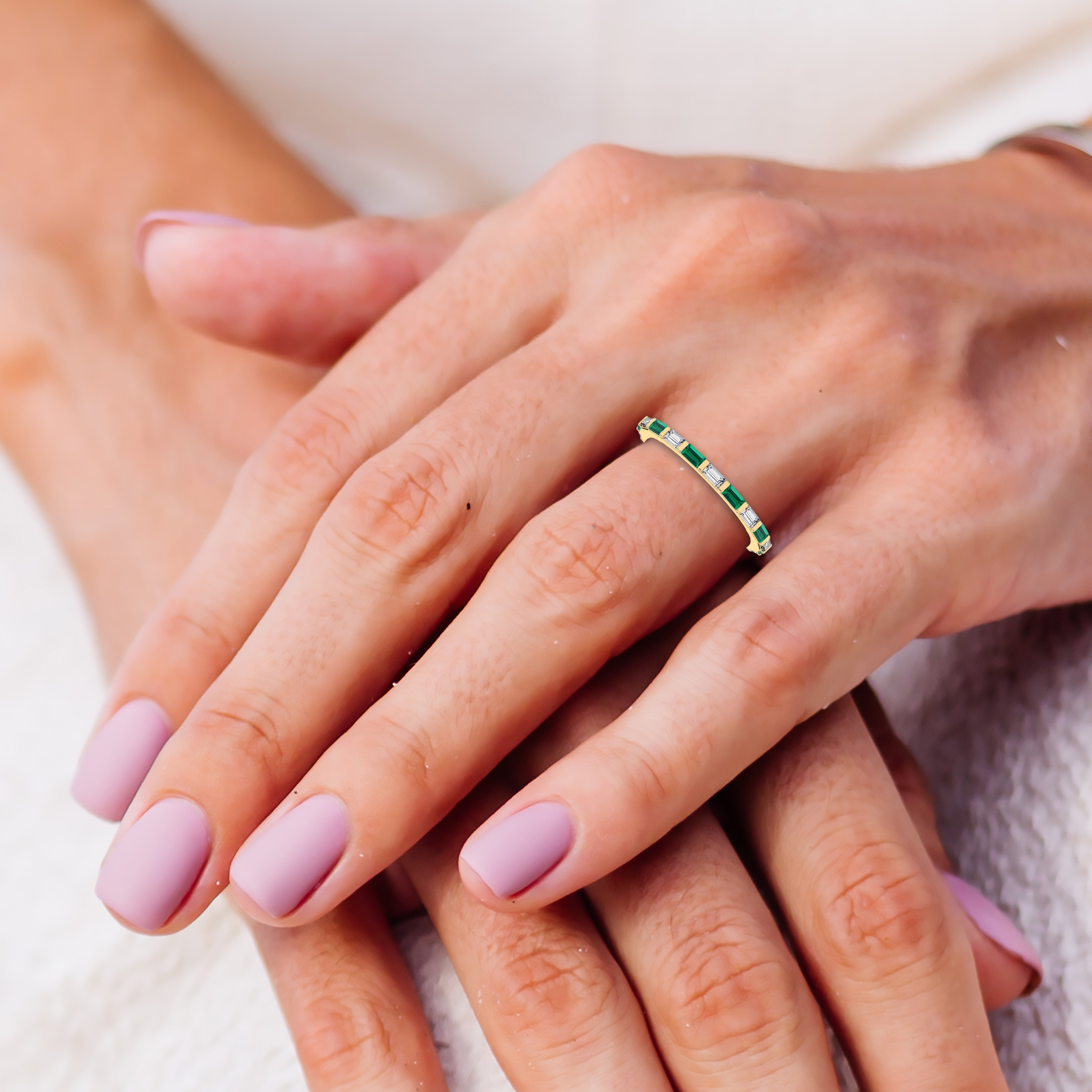 emerald cut baguette ring on model hand