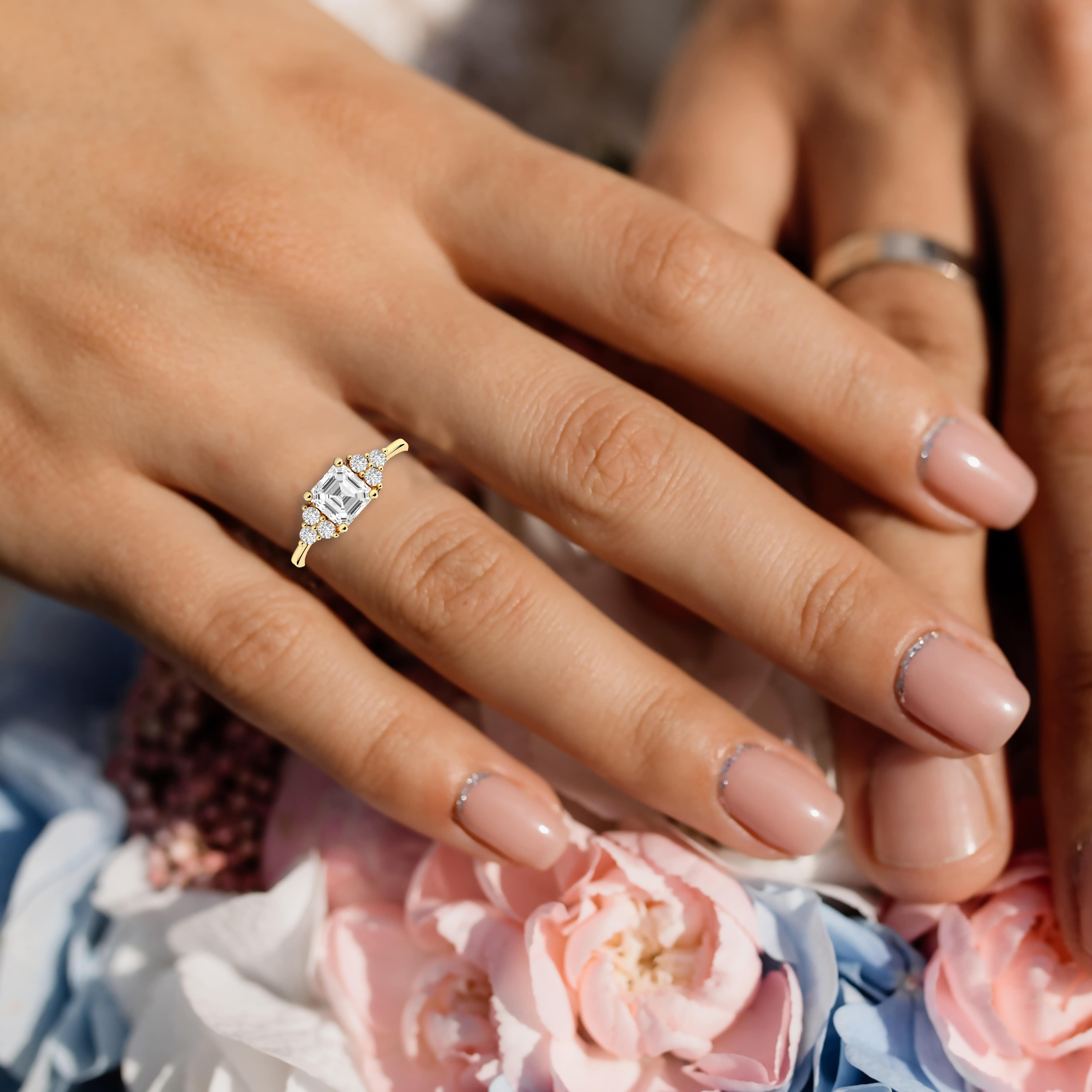 natural diamond engagement ring on hand 