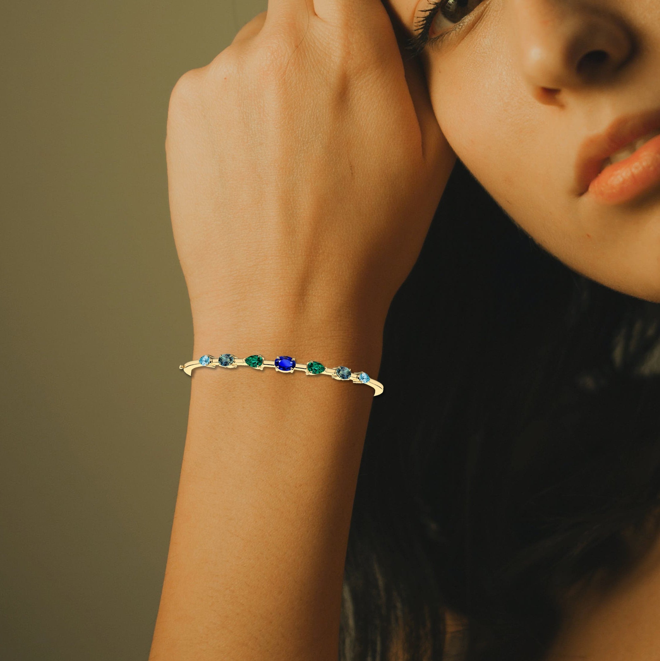 bracelets with gemstones on model hand