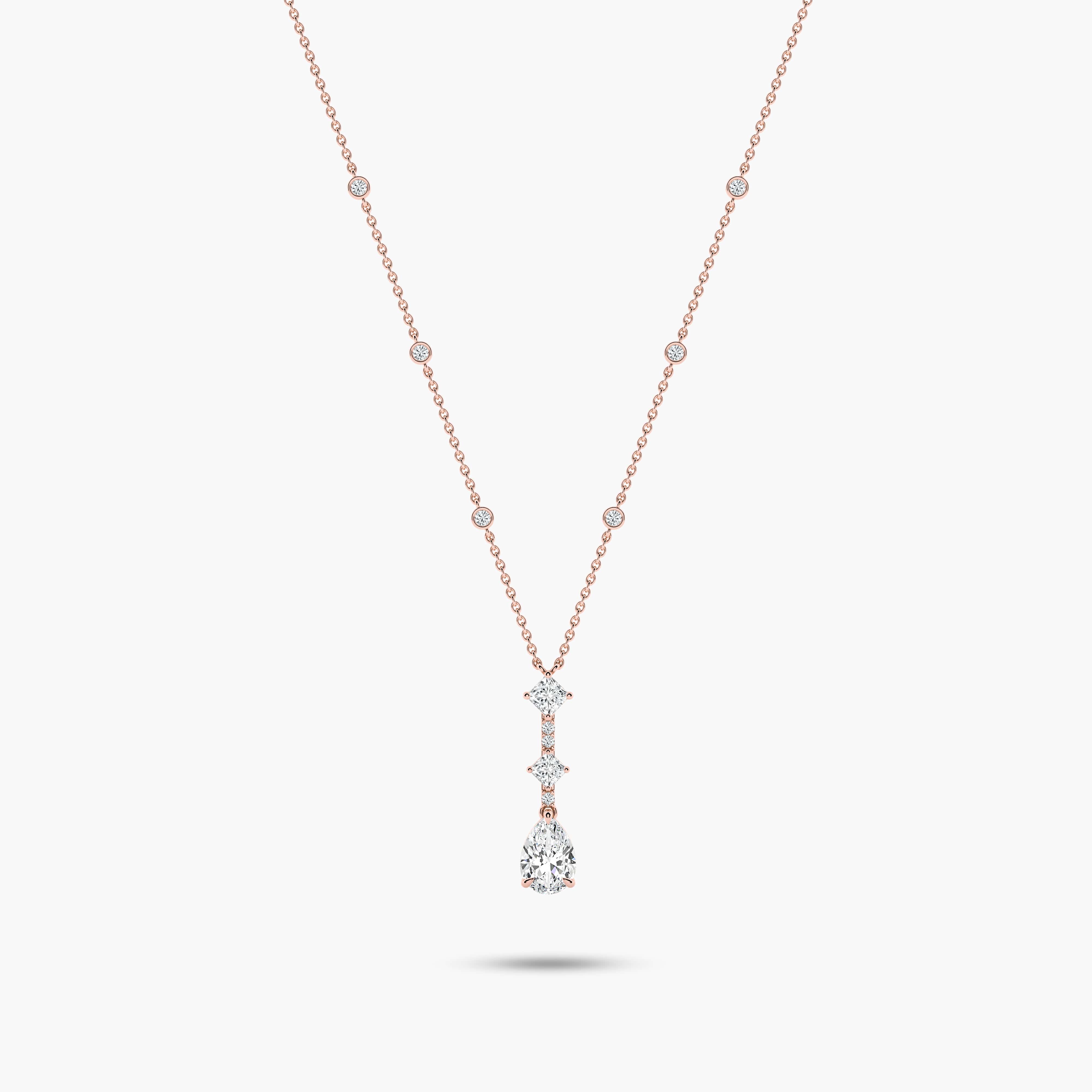 rose gold diamond on a necklace